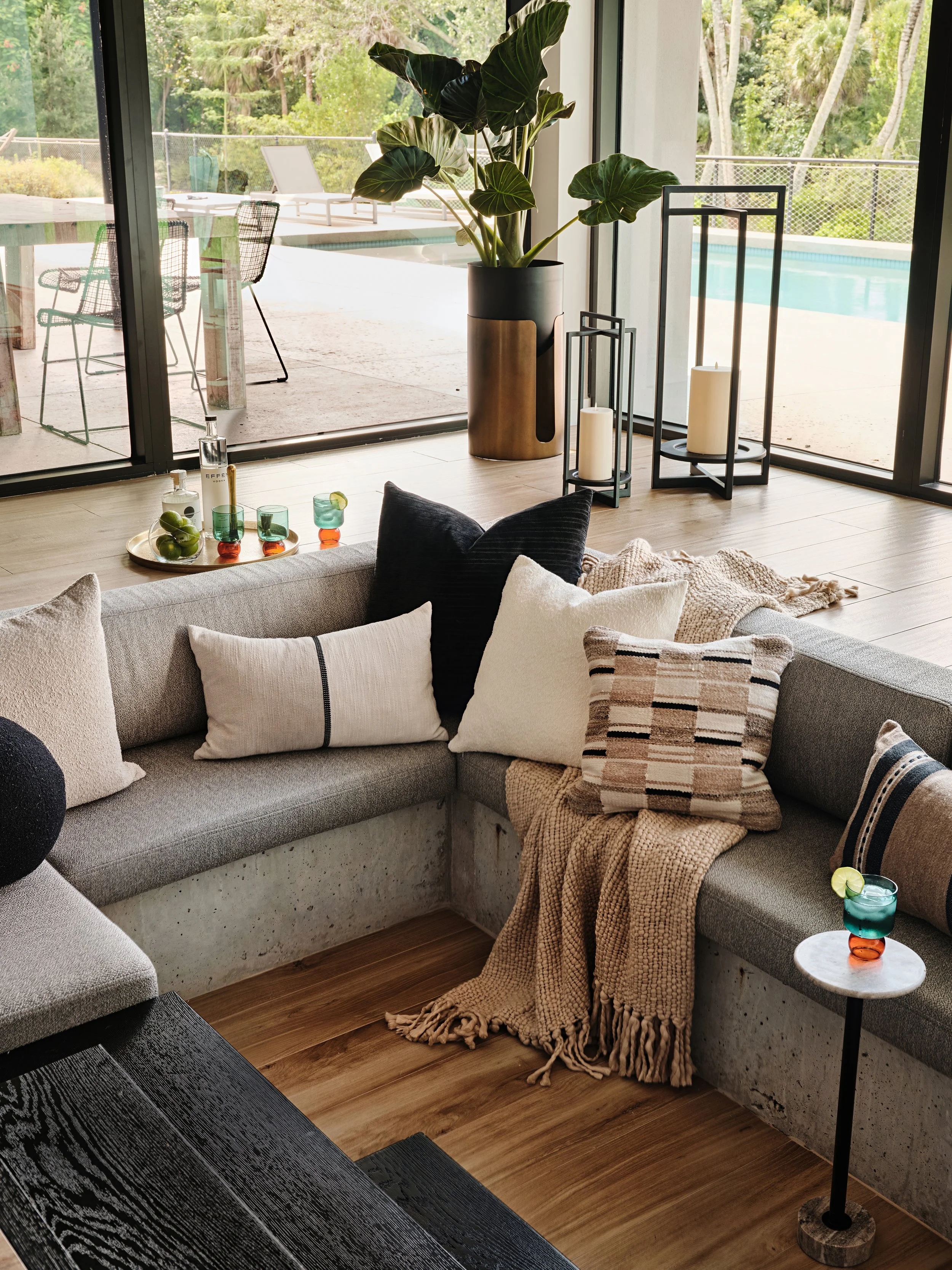 Sunken living room for a new construction home in South Florida. Interior design by Concept 2 Design.