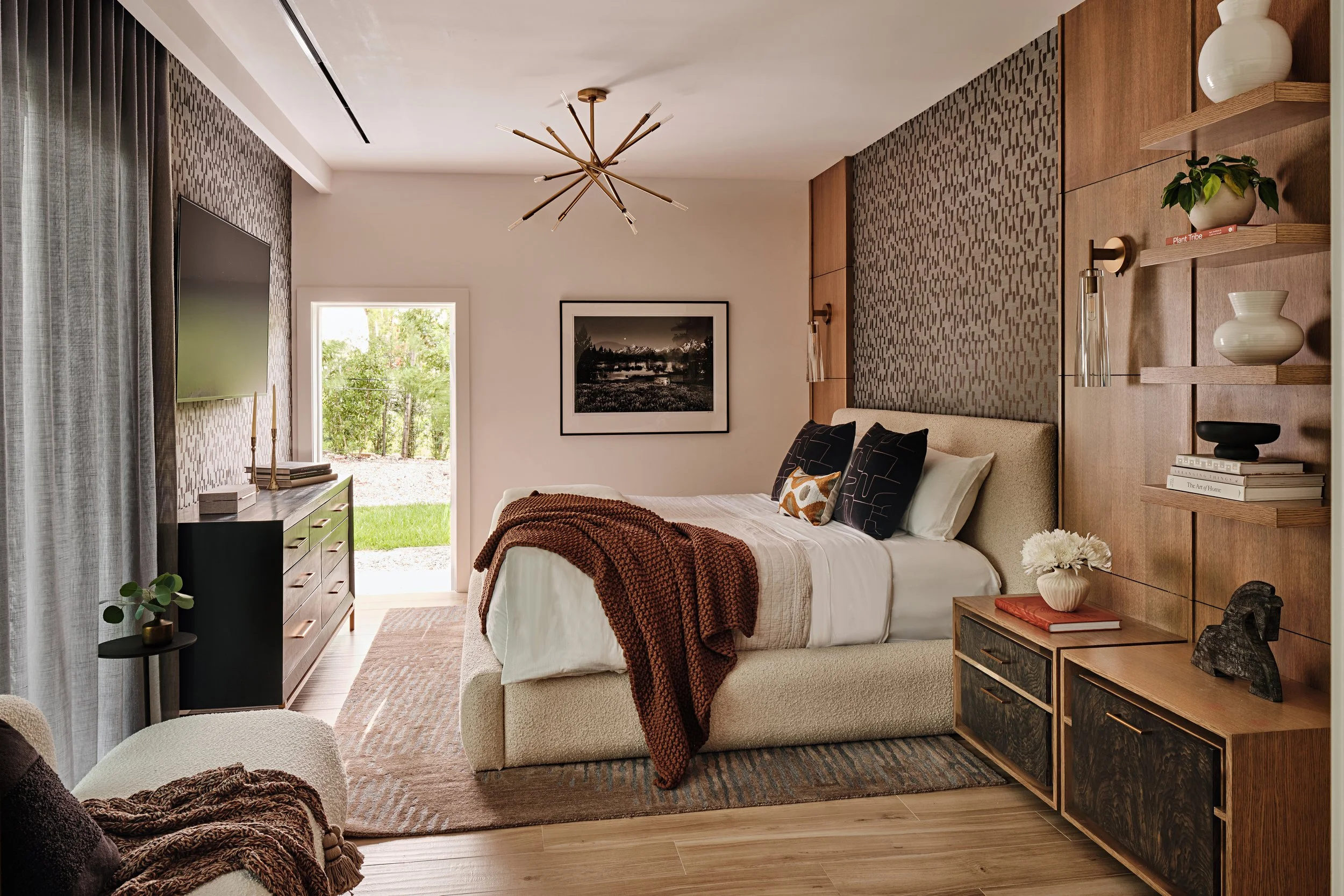 White upholstered bed. Brass pendant light. Main bedroom design for South Florida new construction home. Interior design by Concept 2 Design. 