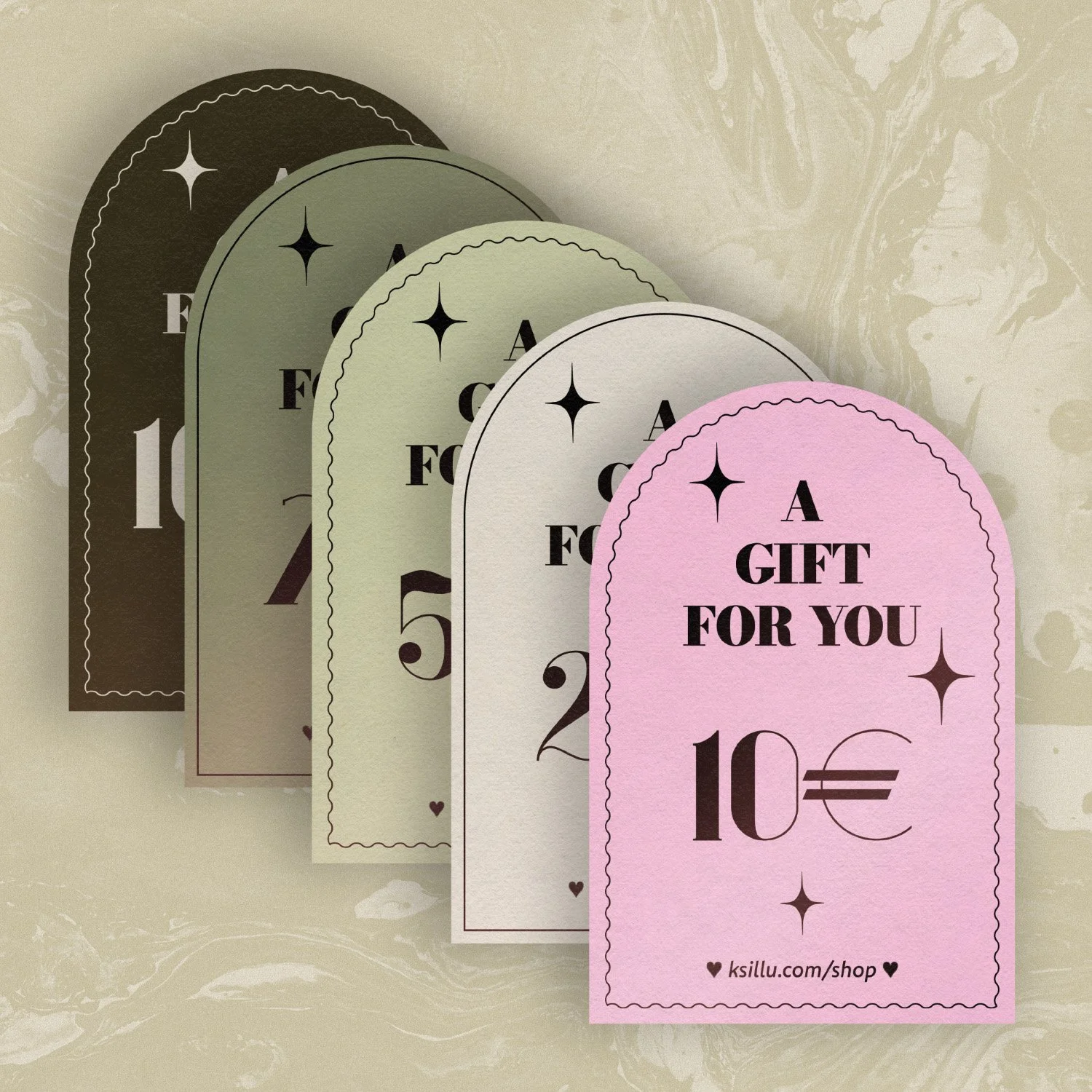 Gift Cards lined up in different colors and different amounts.