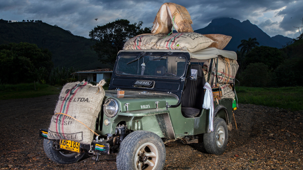 jeep-with-bags-of-colombian-coffee-strapped-in-1024x576.png
