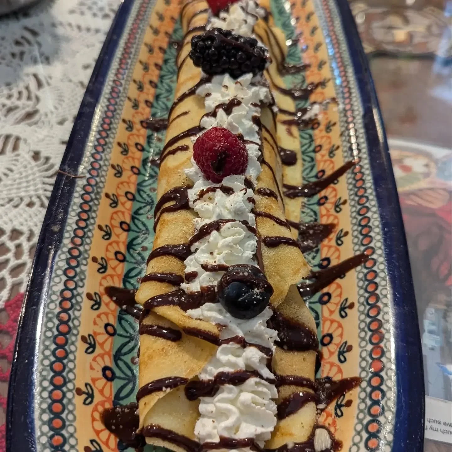 Here is your unsolicited crepe pic of the day! It's almost too big to fit in frame 😏 We've been loving the tart fresh rhubarb compote balanced with the sweetness of the fruit and chocolate! What's your favorite?