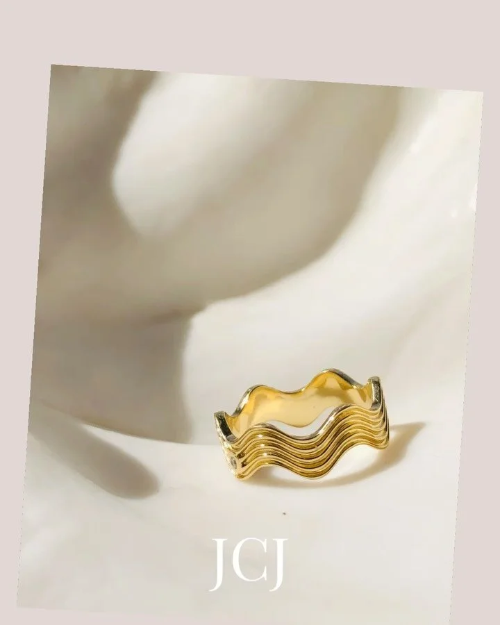 Ric Rac Wave Wedding Rings

Gracefully contoured to sit flawlessly alongside your engagement ring, the Ric Rac Wave is inspired by the fluid elegance of the seashore &mdash; capturing movement, light and timeless romance.

Expertly crafted with or wi