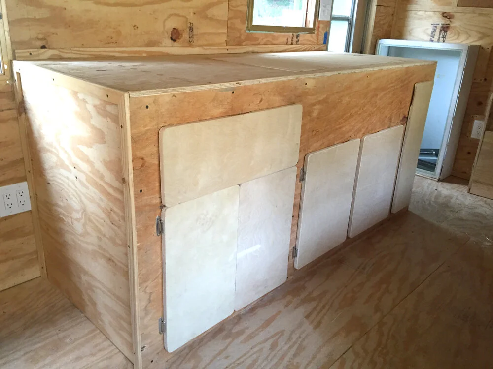 The trailer has cabinets!
