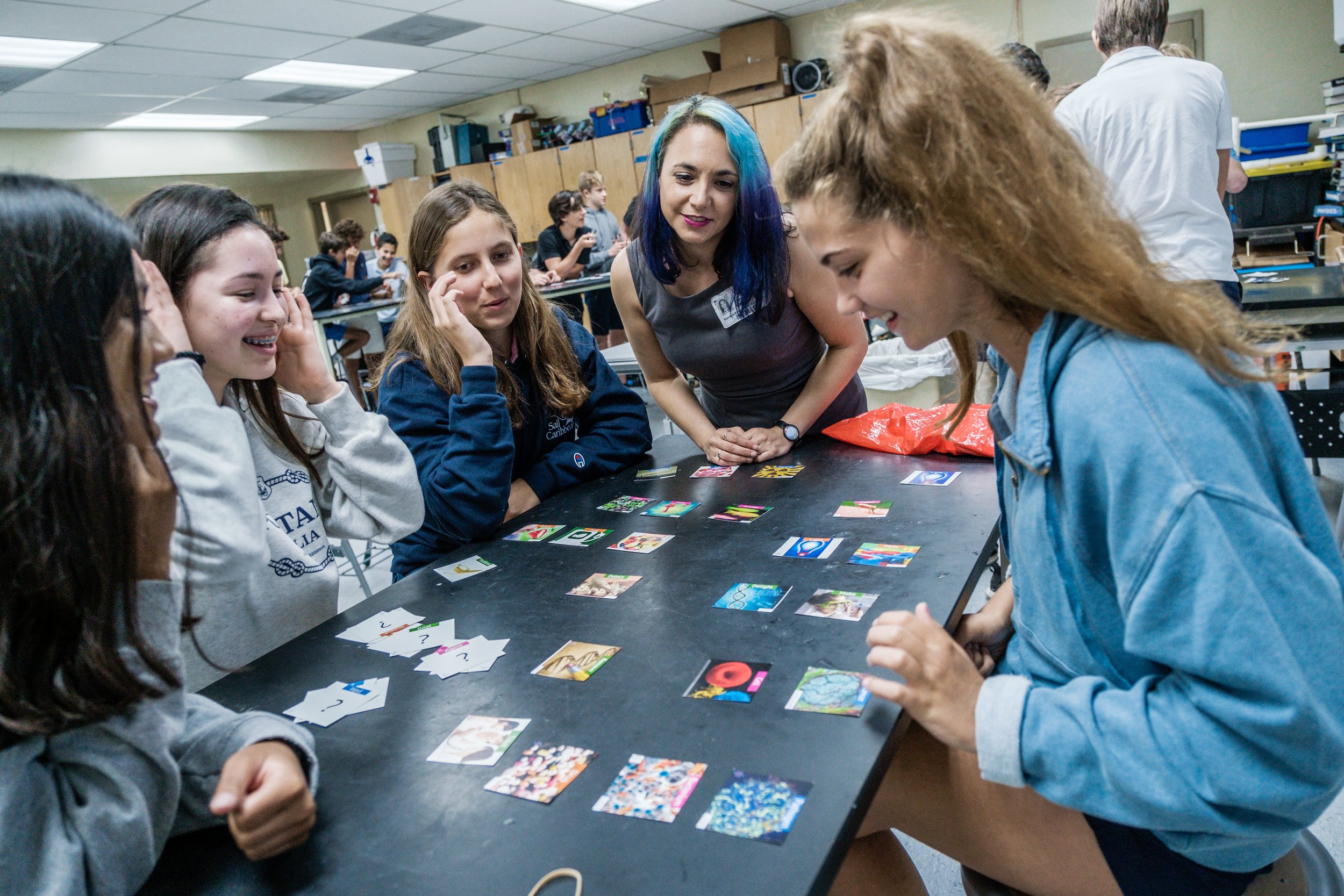 Dr. Tiffany Vora engaging with students to illustrate how social connection and purpose improve brain health.