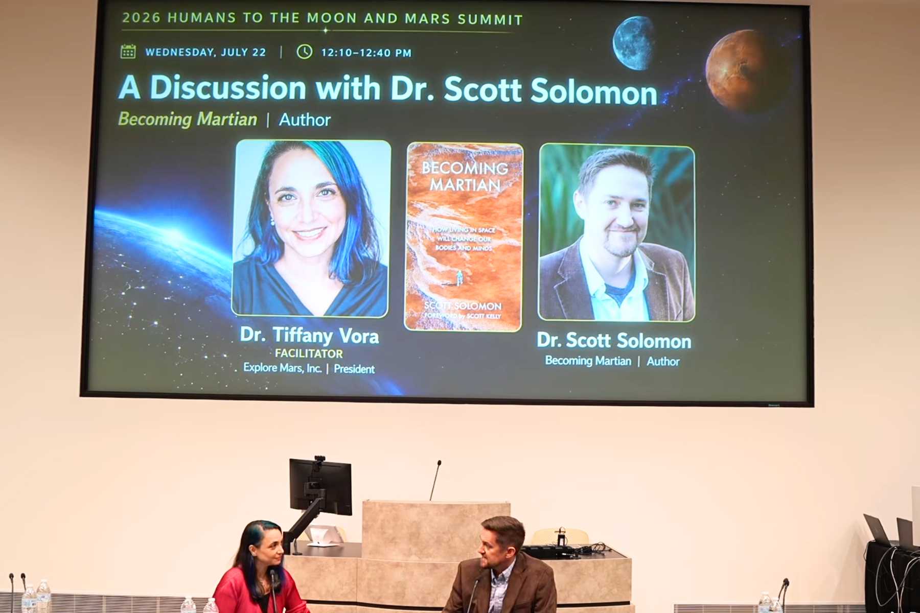 Dr. Tiffany Vora and Dr. Scott Solomon during a conversation about Becoming Martian at the 2026 Humans to the Moon and Mars Summit.
