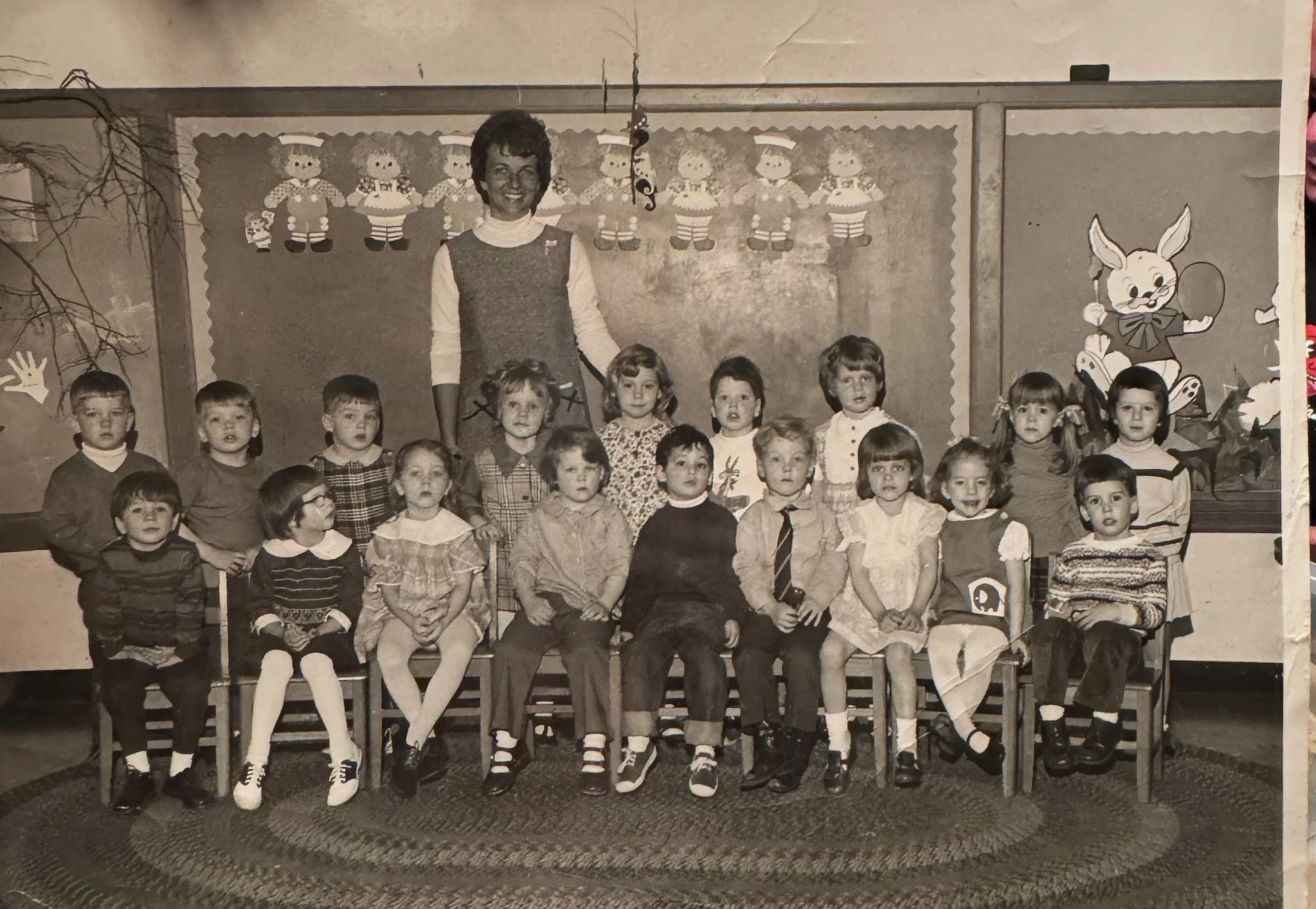 A photo of the class when Mrs. Holly, Former Froggie Teacher, was a student. She is 3rd from left in the front row. (Undated)