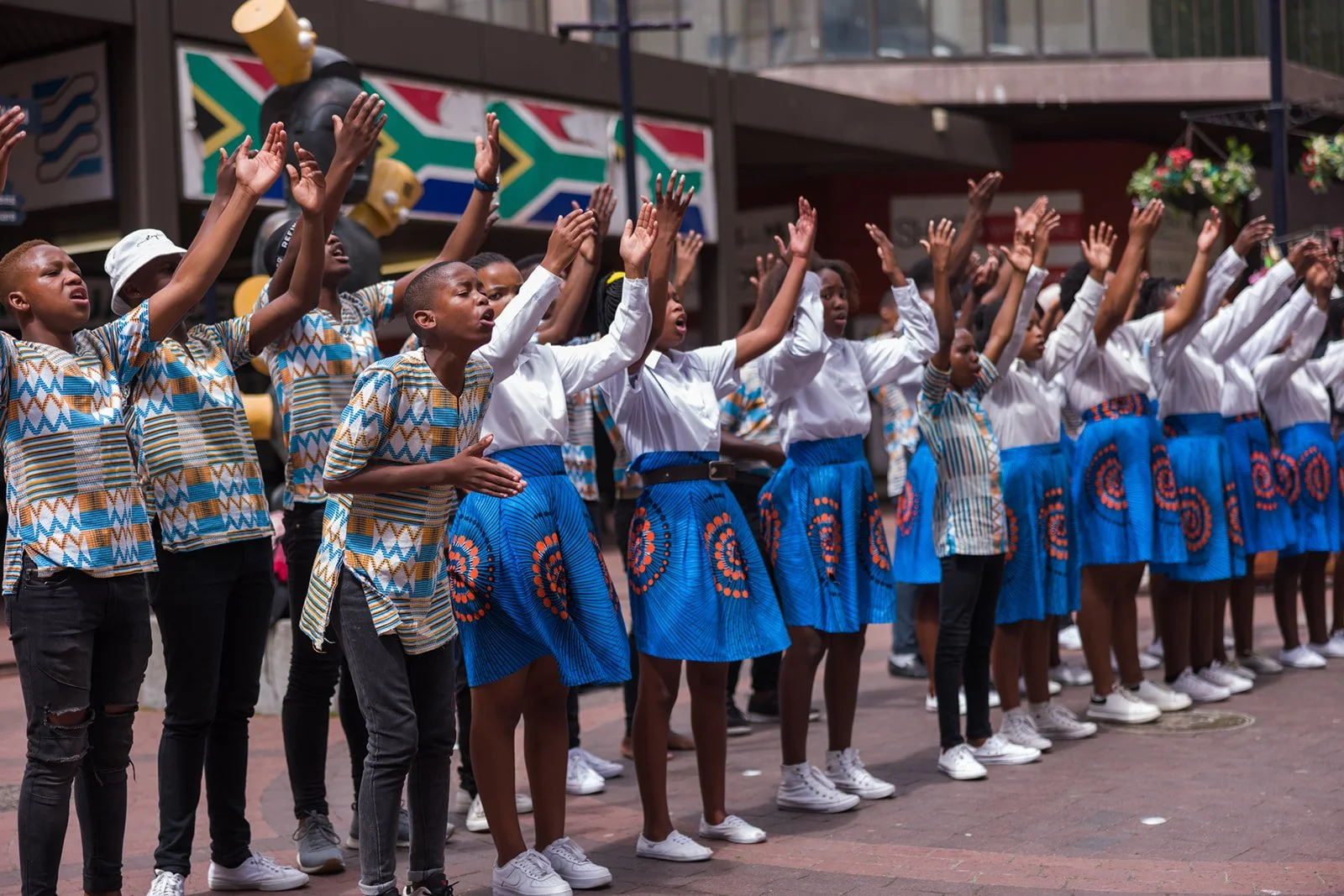 Children singing and dancing in Cape Town South Africa. Photographed by Paul Hairlson Photography