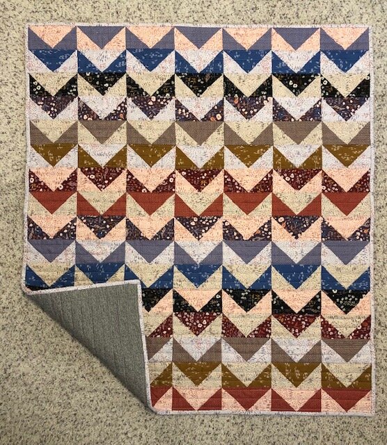 Barb chose one of my favorite new collections from our shop to use for her quilt. Her version was made using Dear Isla, designed by Hope Johnson for Cotton + Steel. She did such an amazing job creating contrast with these shades - and she is so kind and encouraging too! You can see more of Barb’s quilts on IG @blockandborder.