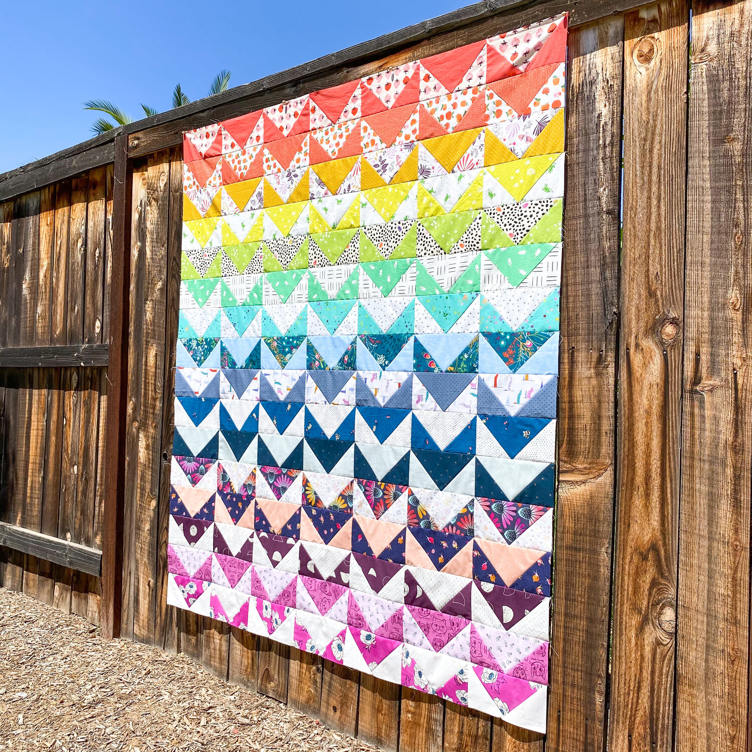 As Erin’s quilt came together, I was sitting at the edge of my seat! With each sneak peek I could barely wait to see more! I love the bright and bold shades and the way they transition with the scrappy background fabrics. I first found Erin through bag making, but she can make anything - and she shares it all on IG @limabeanloves.
