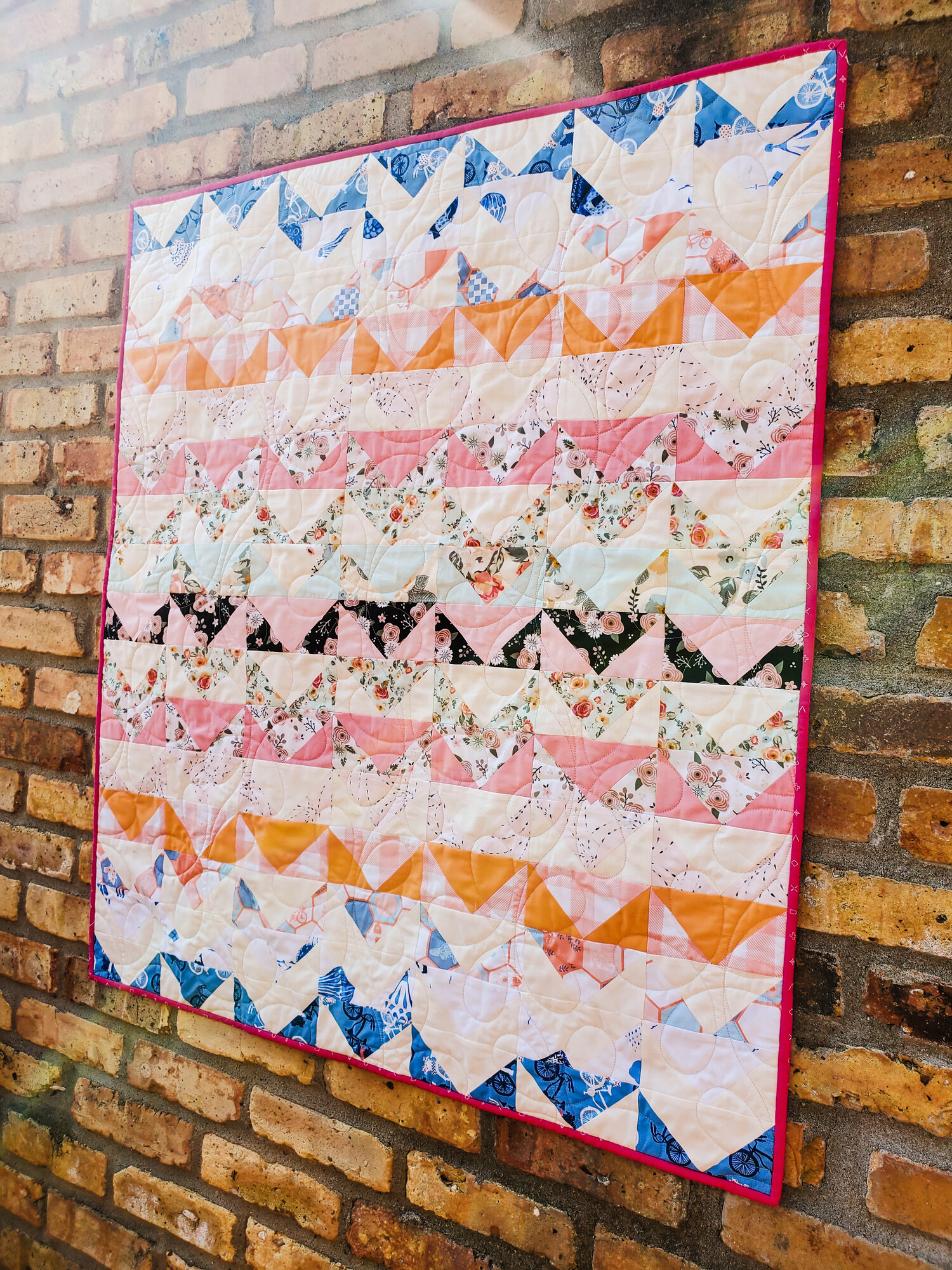 Sandy is so kind and supportive. She is an expert pattern tester and long arm quilter! I love the contrast she created with prints and solids for her quilt. And those dreamy florals, of course! Check out Sandy’s other work on IG @thaicharmllc.
