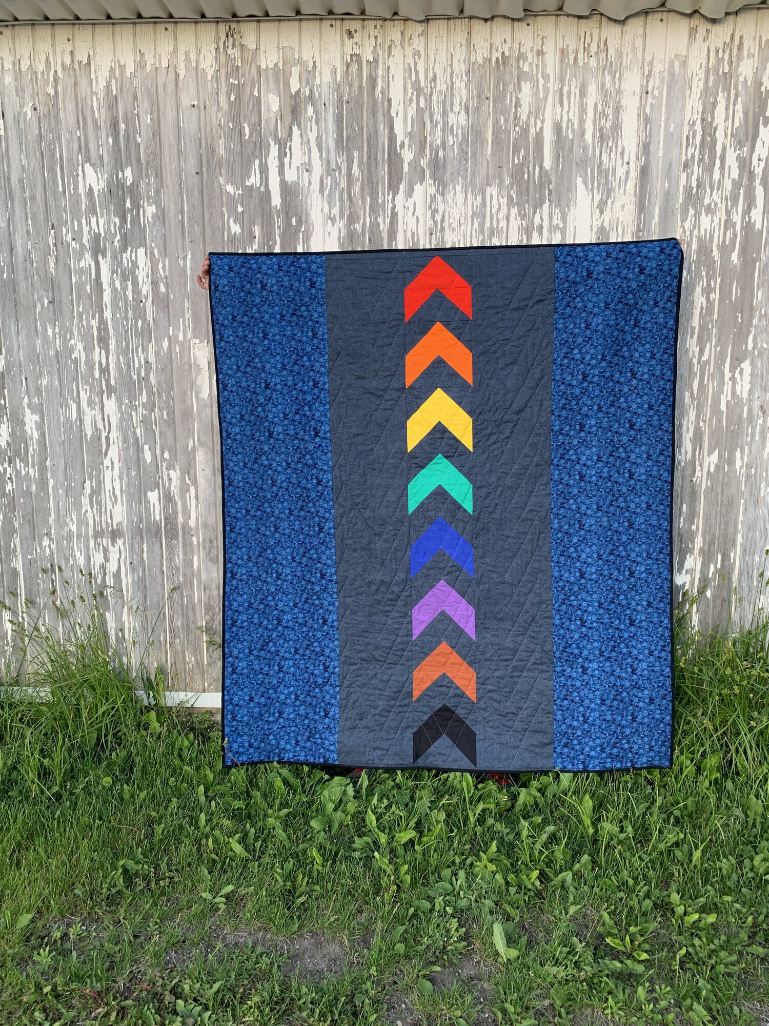 I just had to show the front and back of Melanie’s quilt! She used her pride flag kit from Art Gallery Fabrics, paired with a textured navy fabric for the background. I love how she used each color on two rows, which changed the look of the quilt! She also used the extra flying geese to make a pieced backing and it looks so amazing! Melanie shares her work on IG @koalamommily.