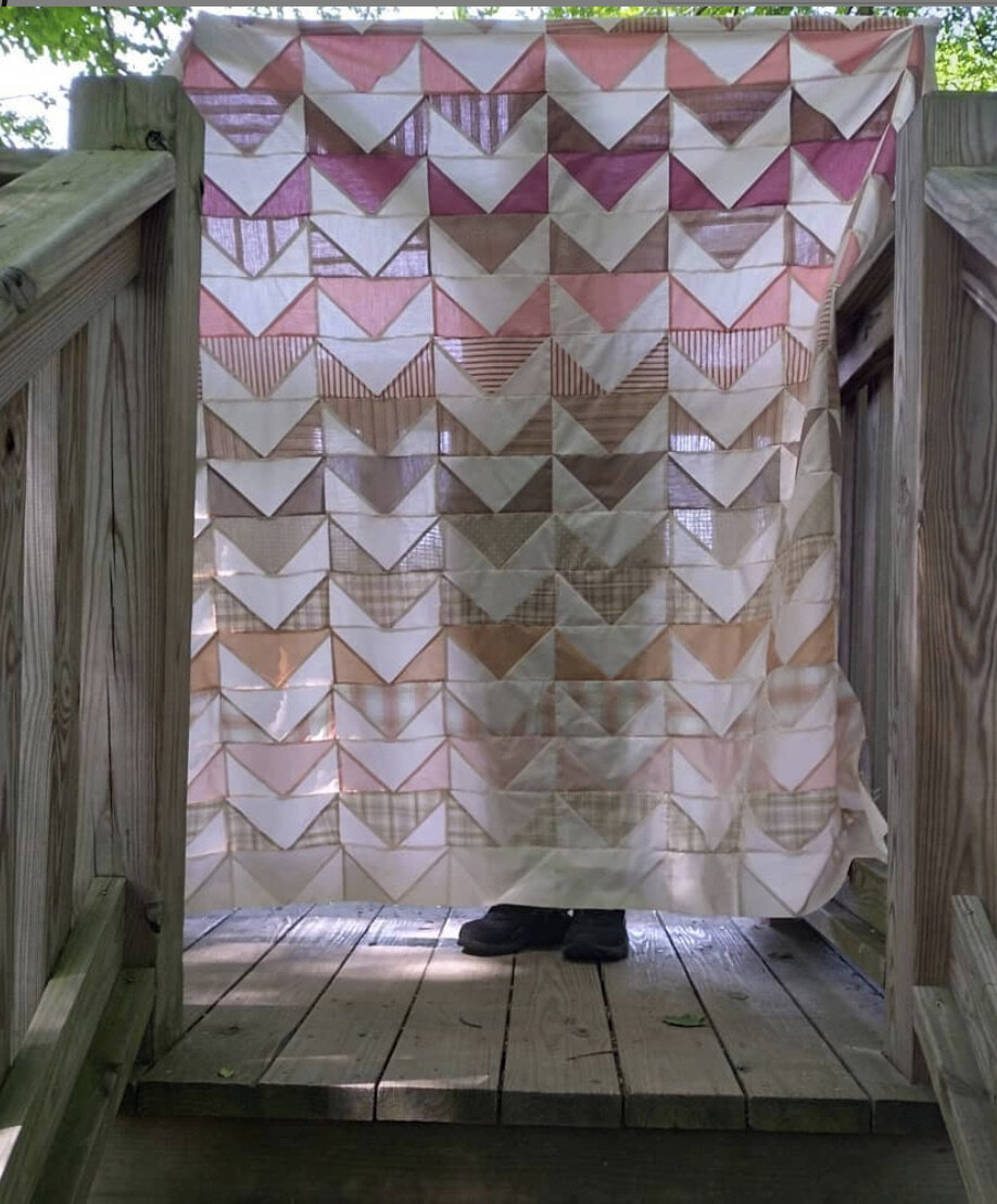 Angie wakes up early to sew before work and she worked so hard to get her quilt done in time for my pattern release date! I am so thankful - she did such a beautiful job! She chose a variety of wovens in shades of pink/red and neutrals. I love this …