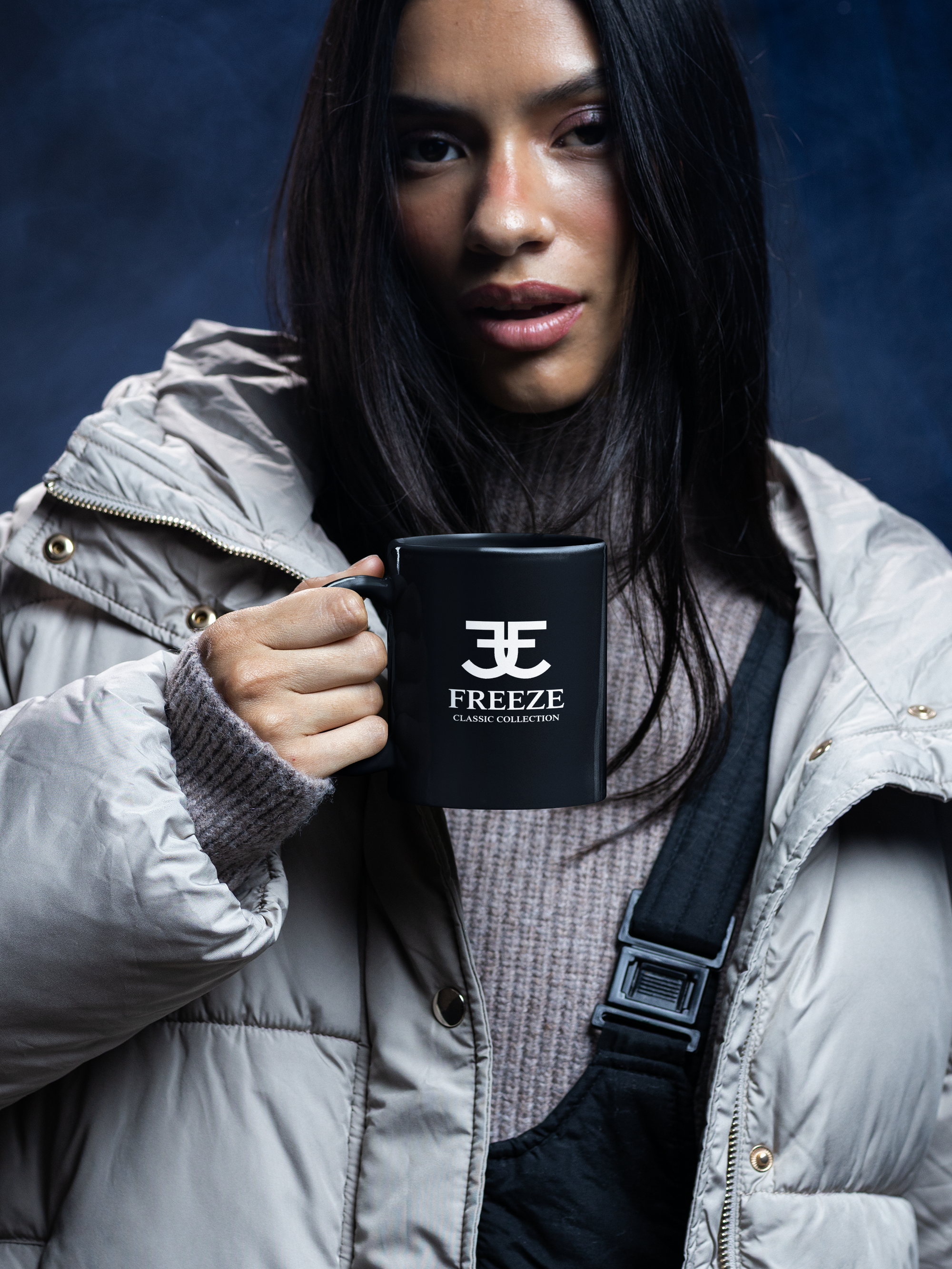 coffee-mug-mockup-featuring-a-woman-wearing-winter-clothes-in-a-cold-inspired-setting-m59234.png