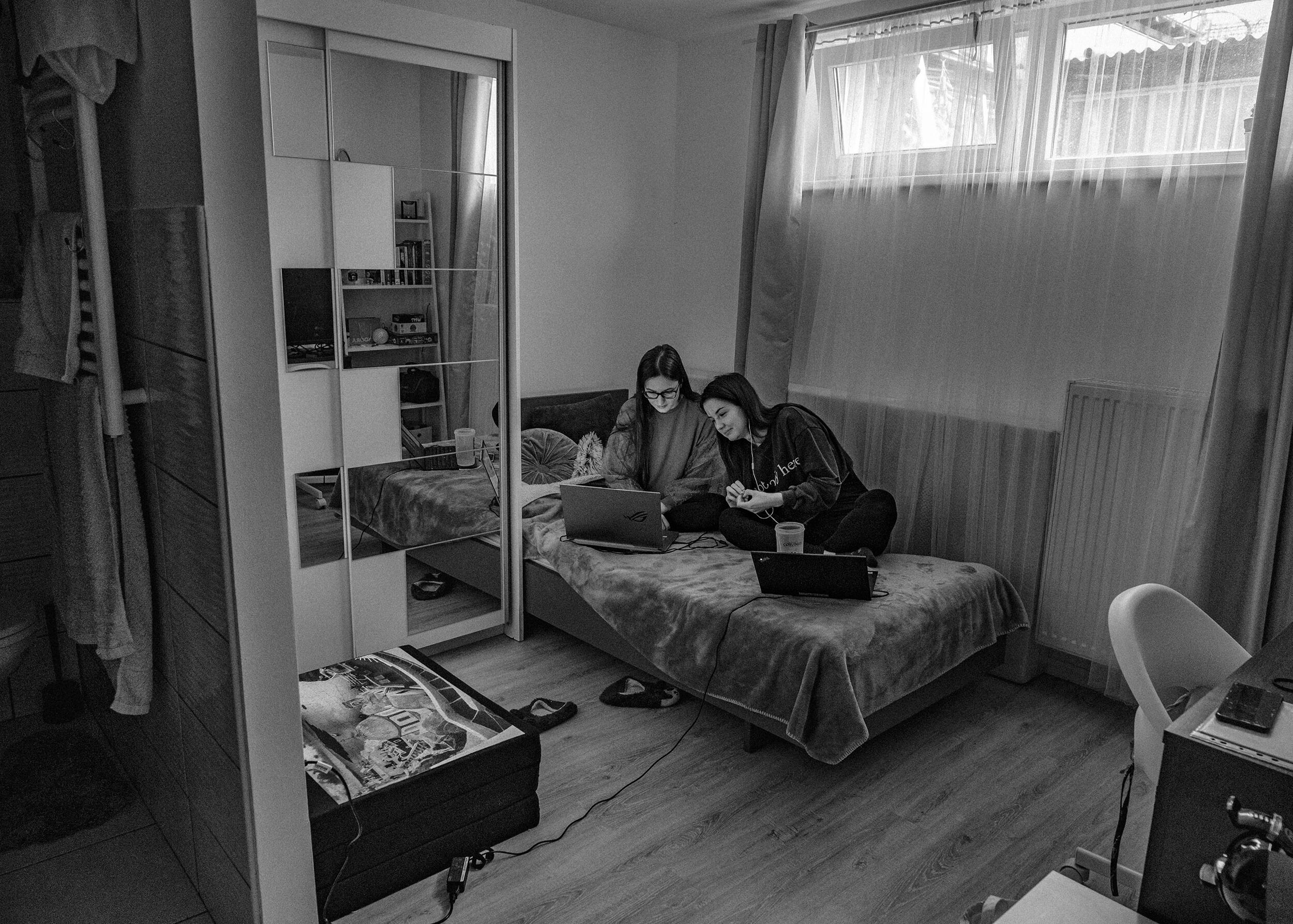  University classmates  Bogi  and  Nia  in Nia’s room in Budapest. Both of them stayed in college until March 2020, when the government started to empty all the student dorms country wide because of the emergency. Students were forced to move home or