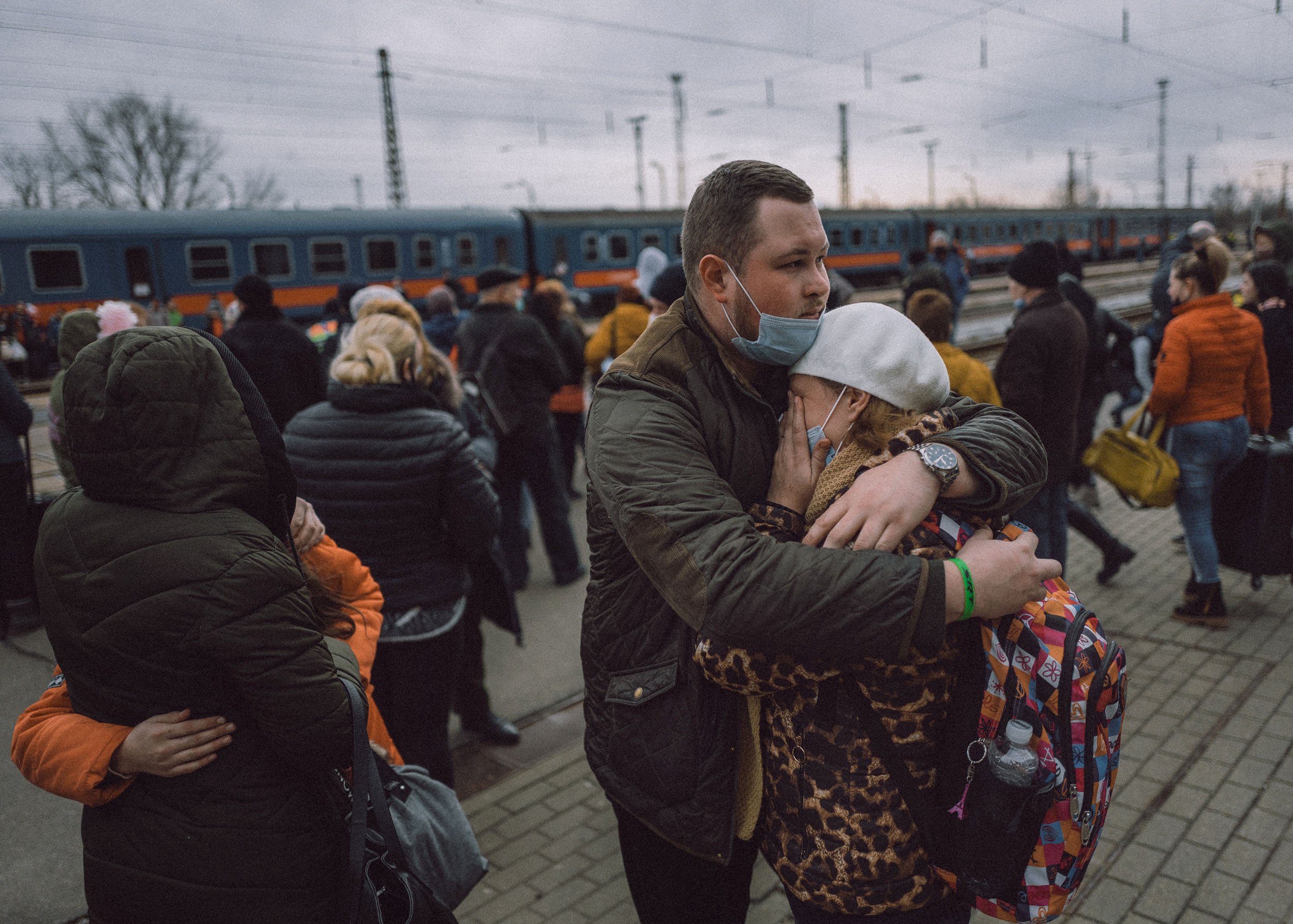  Family re-unite at the train station after crossing the border at Zahony-Csap as they flee Ukraine on February 26, 2022 in Zahony, Hungary 