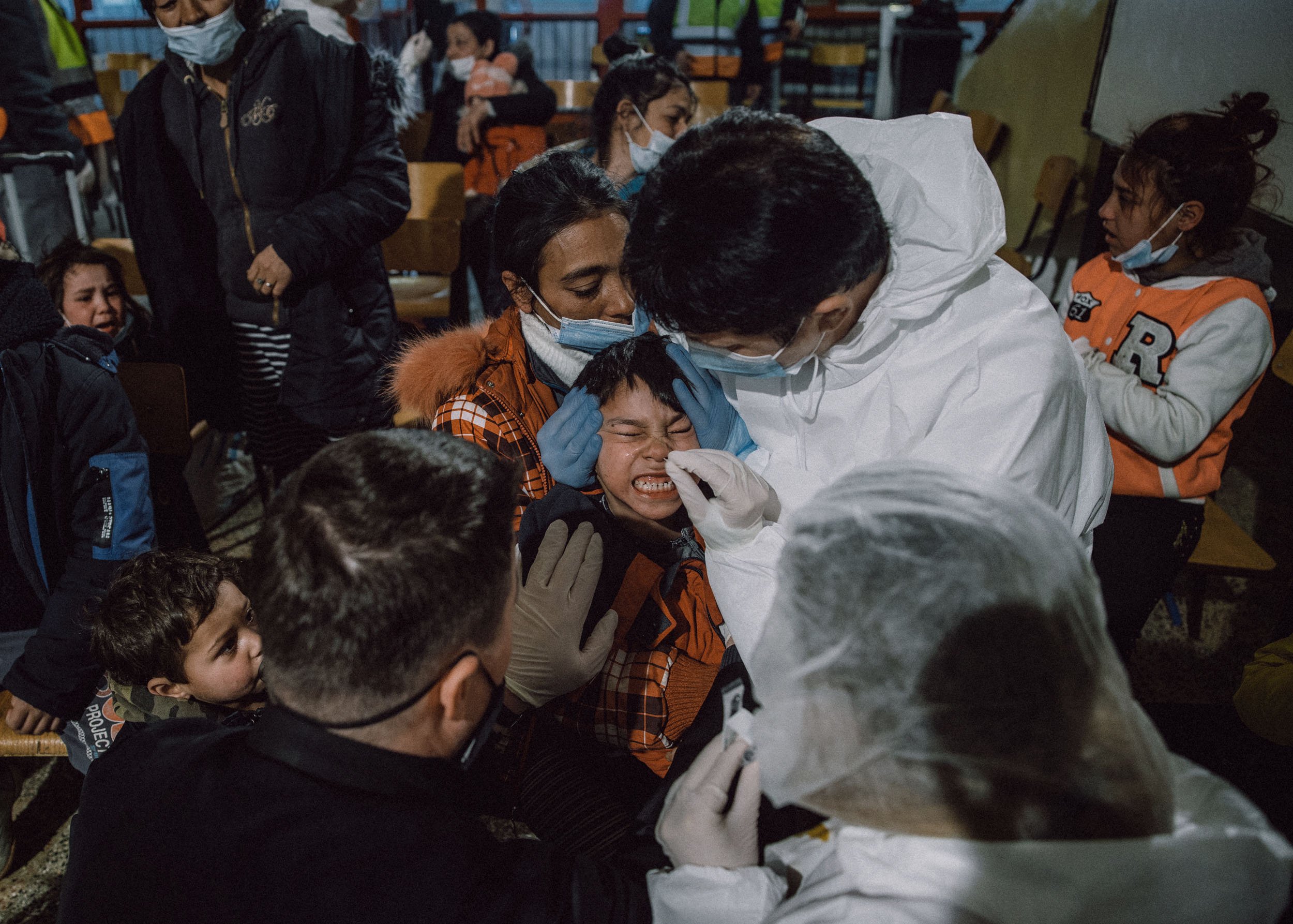  Kids are tested for Coronavirus in a temporary shelter developed from the local school after border crossing at Zahony-Csap as they flee Ukraine on February 28, 2022 in MANDOK, Hungary 