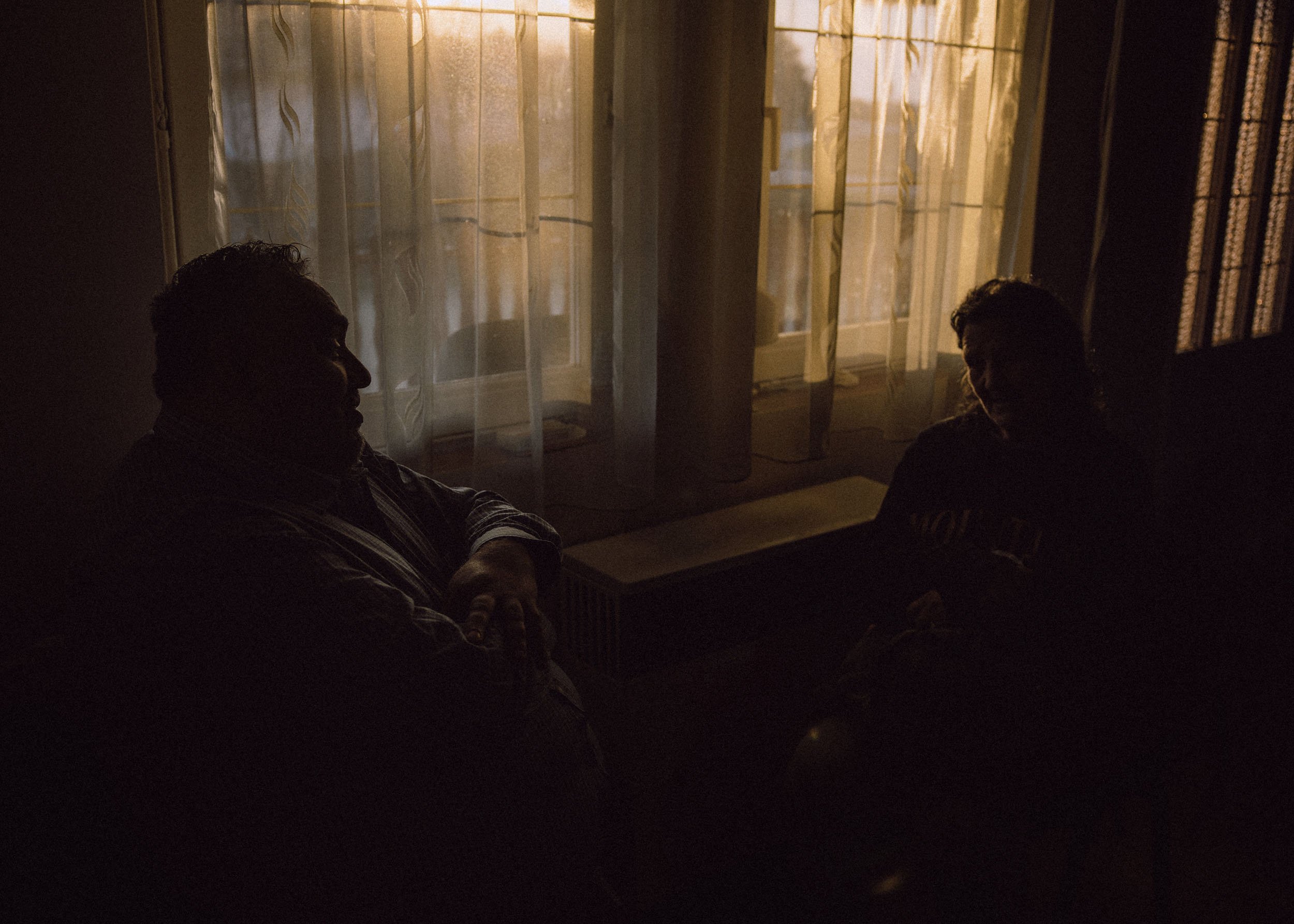  Edgar (L) (64), the leader of the "Free Christian Church" talk with a refugee woman during a worship on March 20, 2022 in Uszka, Hungary. Prior to the war, Ukraine had an estimated population of 400,000 Roma, with the largest concentration in the re