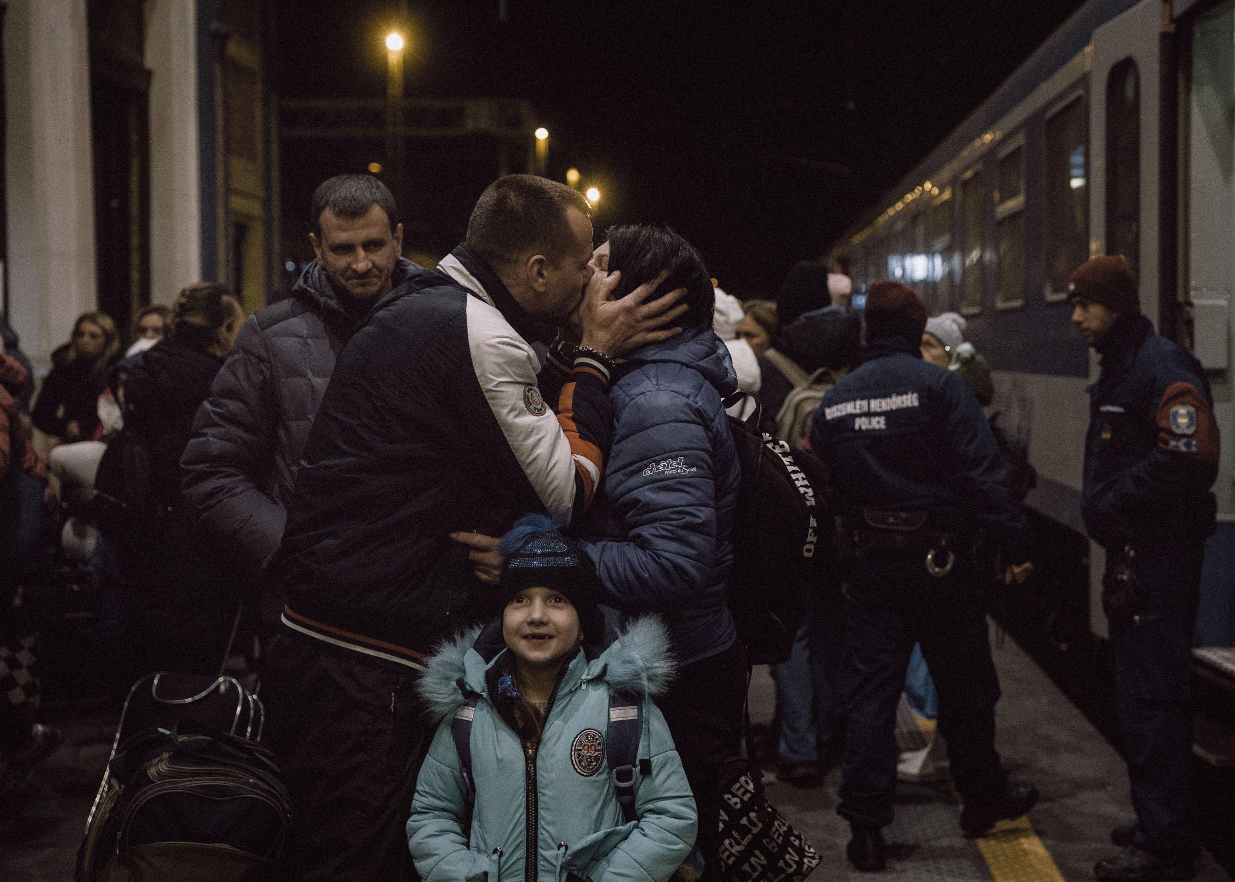  A family is re-united with relatives at the Western Railway Station after crossing the border at Zahony-Csap as they flee Ukraine on March 7, 2022 in Budapest, Hungary 