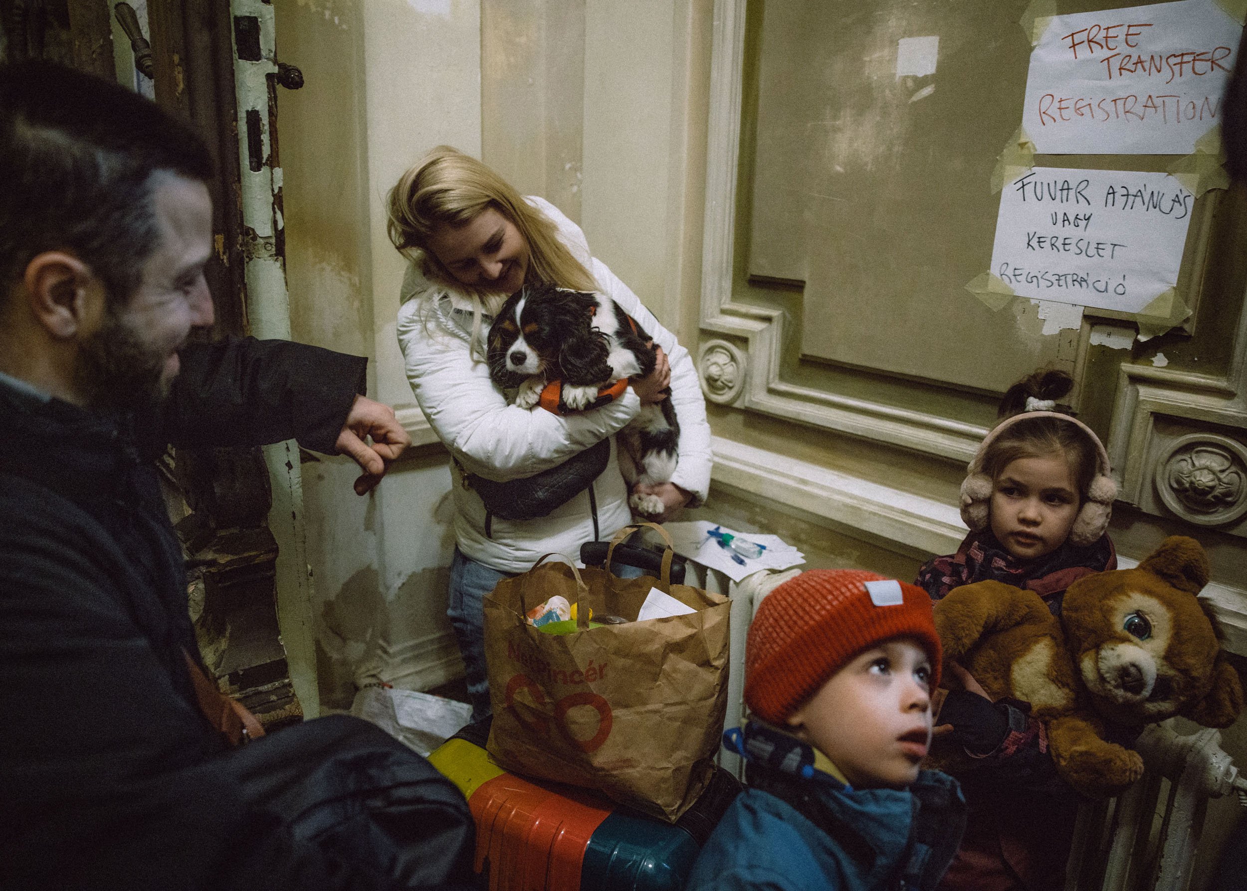  Ukrainan family wait at the Western Railway Station from Zahony after crossing the border at Zahony-Csap as they flee Ukraine on March 02, 2022 in Budapest, Hungary 