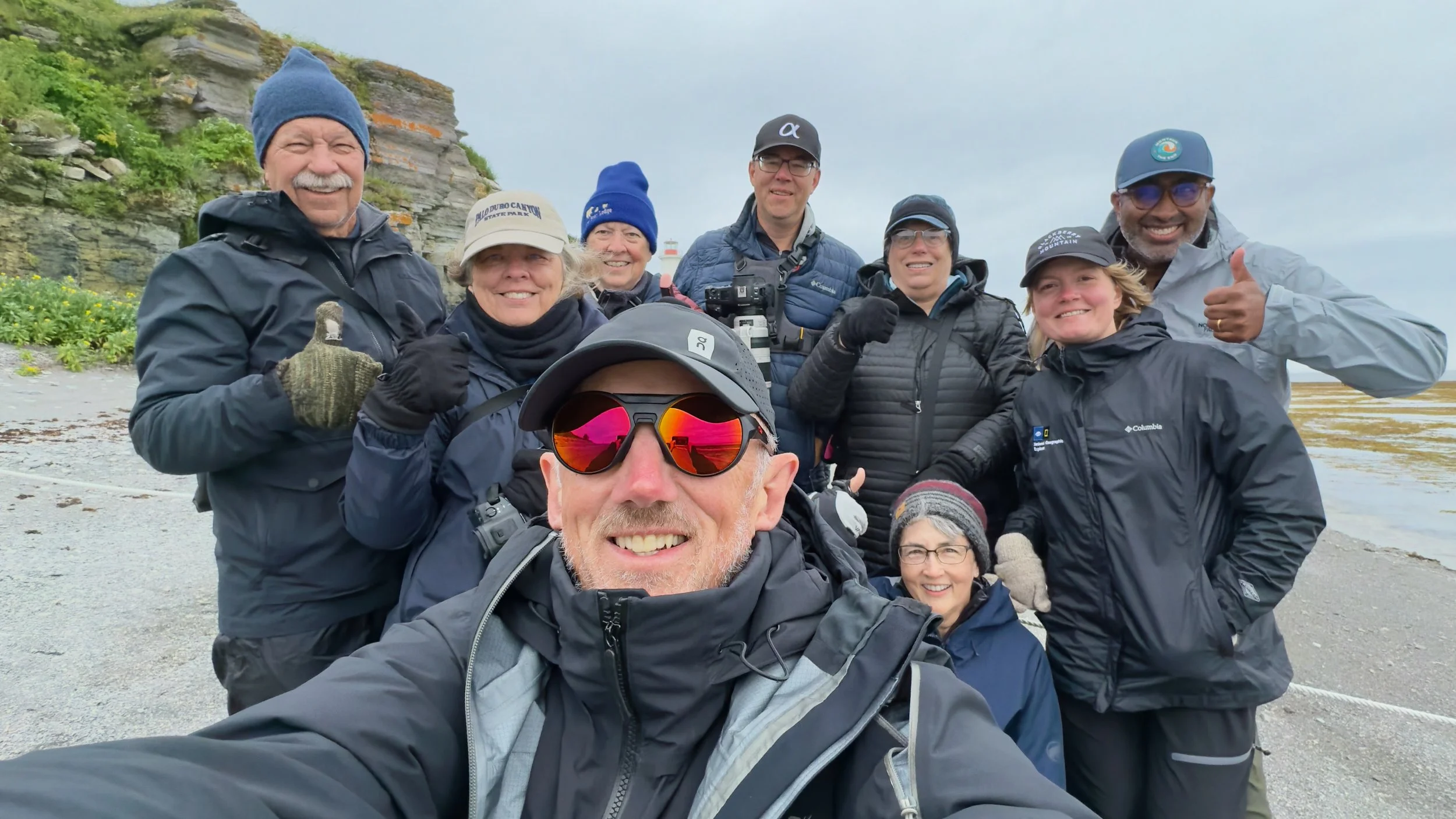 Group 2: Puffins Galore workshop group with Christopher Dodds during the 2026 Atlantic Puffin photography workshop on Île aux Perroquets.