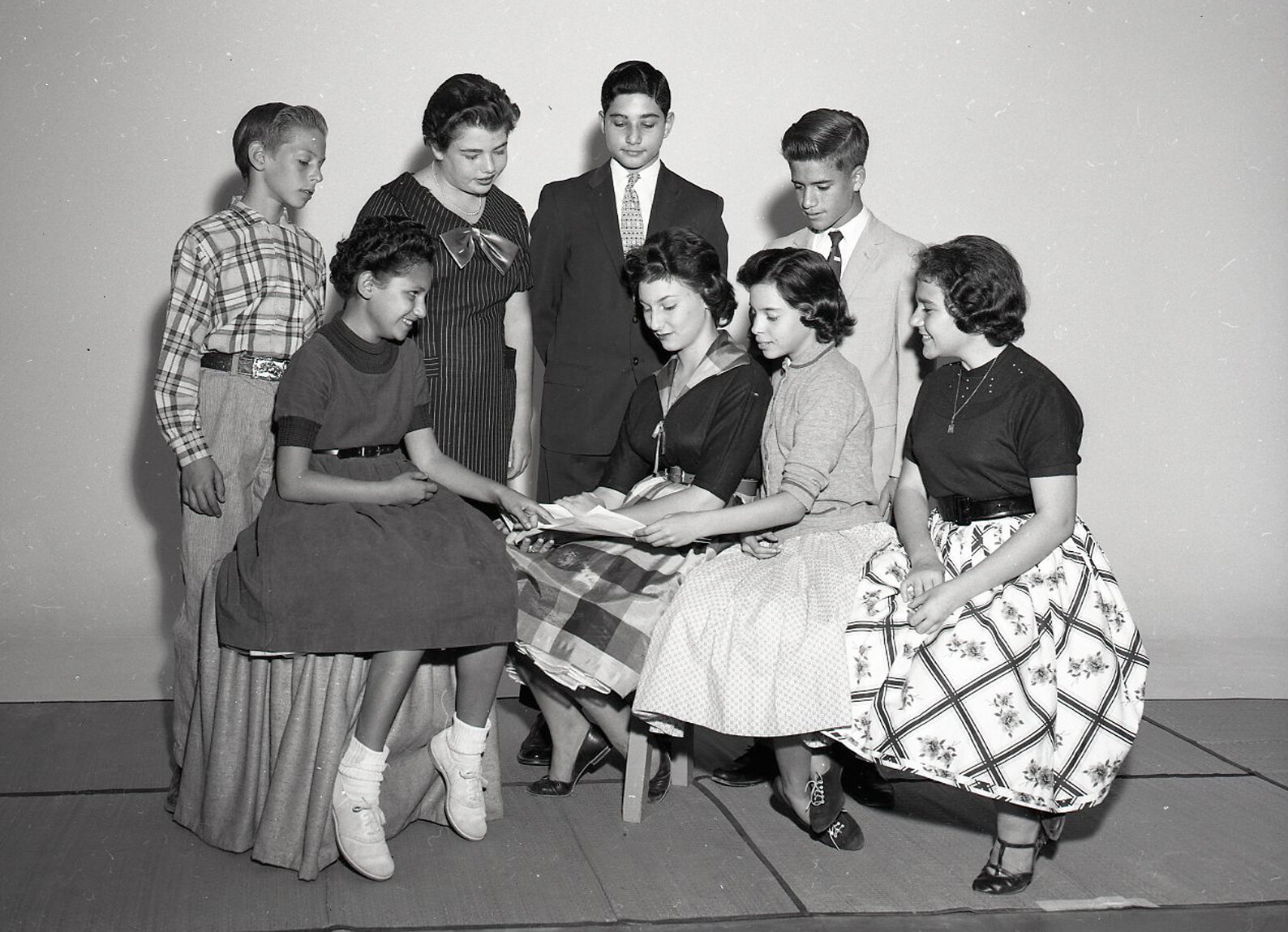 Young Judea members planning for the Chanukah dance in 1958