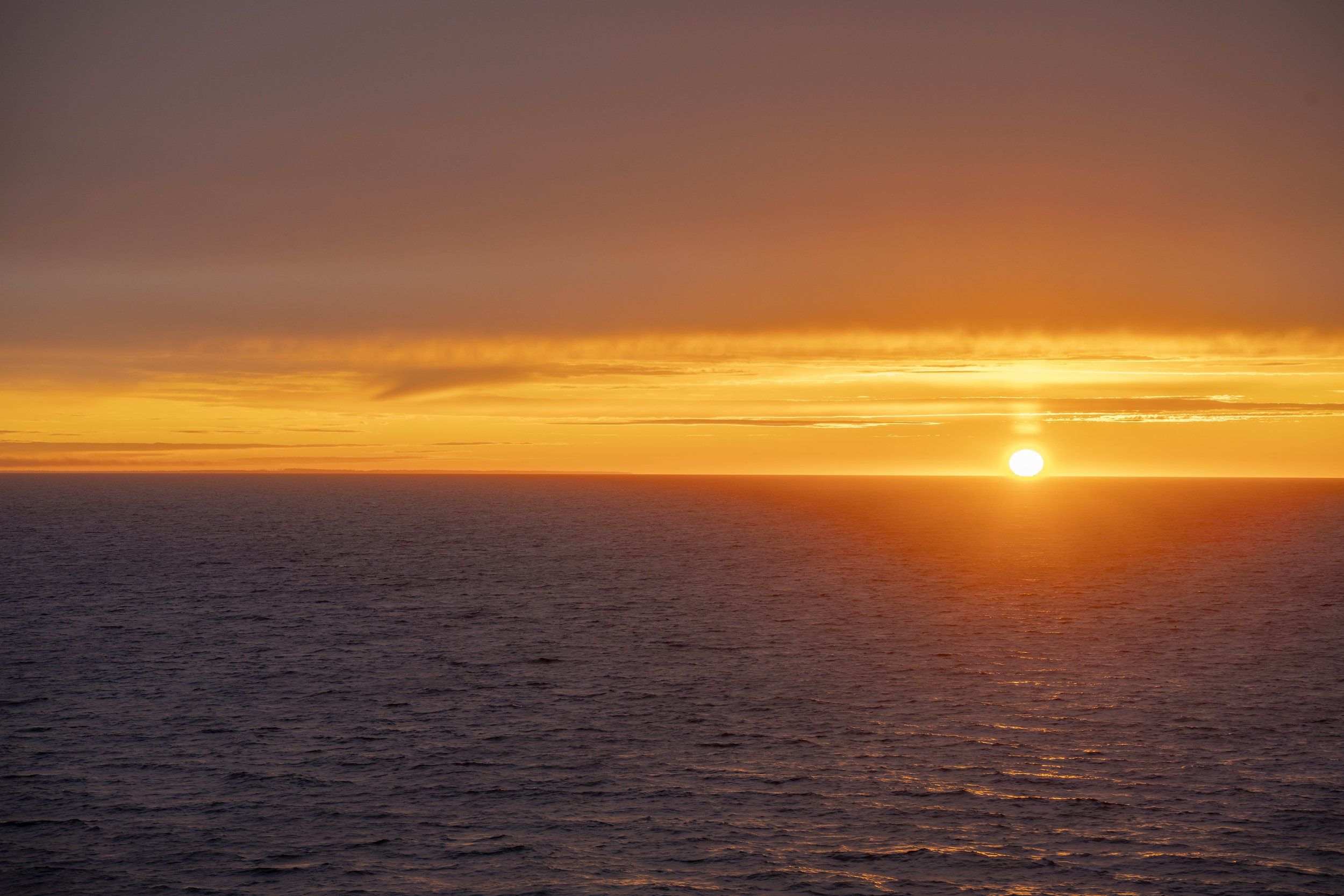 A glowing sunset reflecting off the ocean.