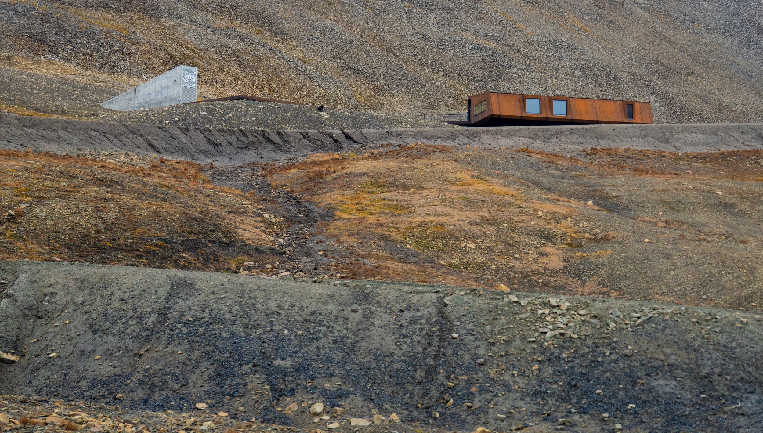  The door to the Seed Vault (left) and a building that we can’t help you identify (right) (photo/Jason Rafal) 