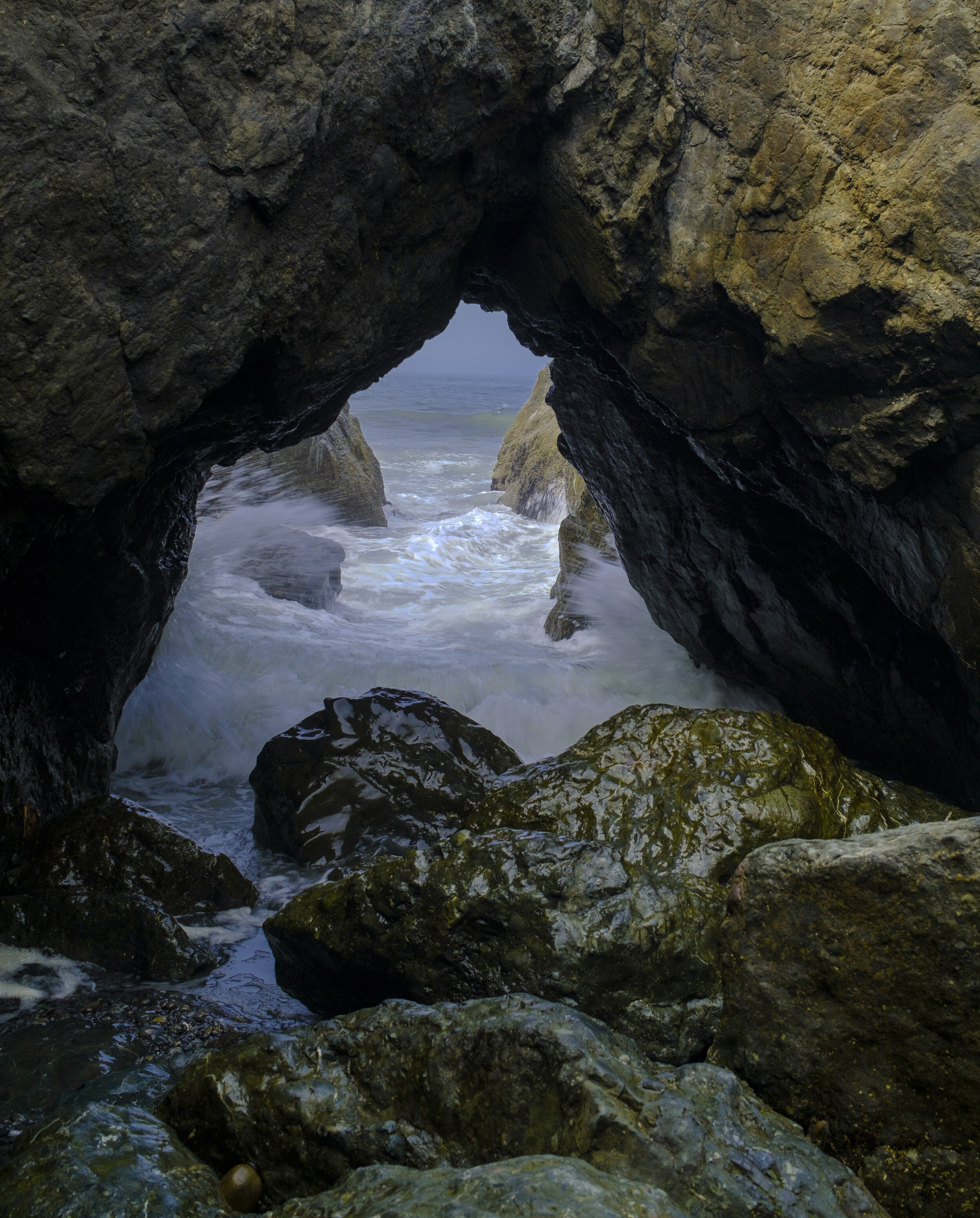  Watching waves through caves (photo/Jason Rafal) 