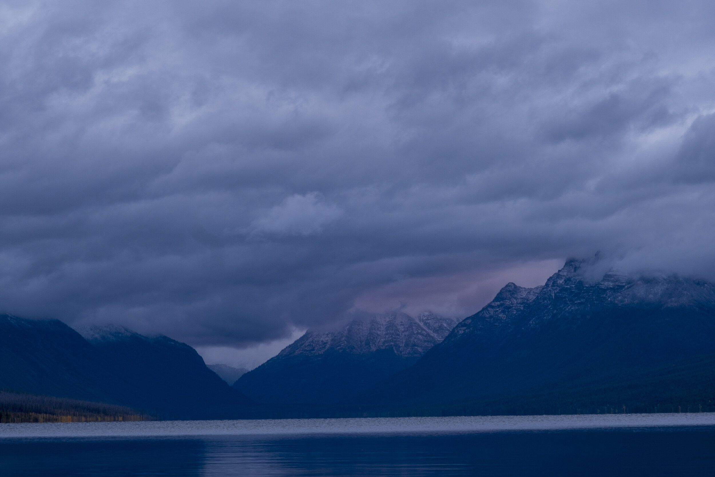 A dim sunrise over Lake McDonald on our first morning at the park (photo/Jason Rafal)