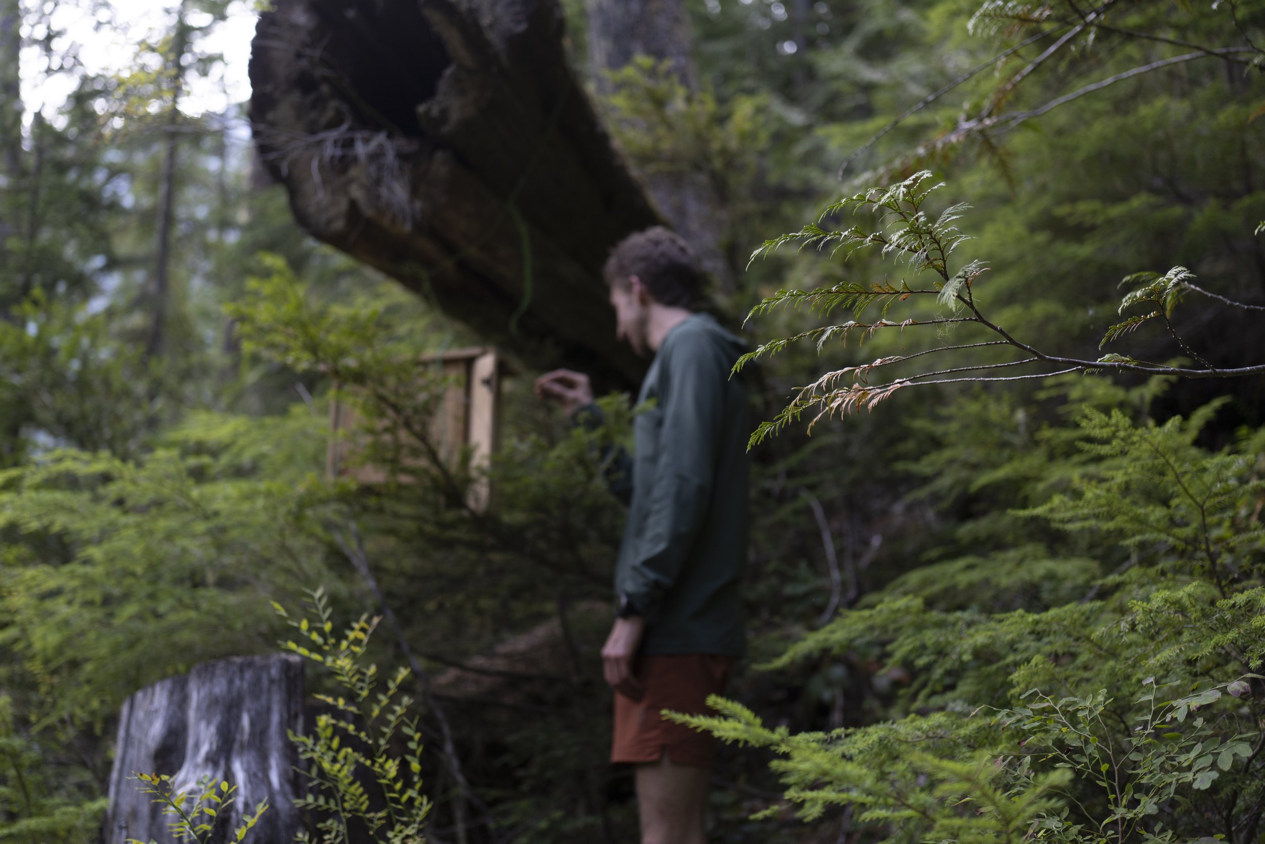  Martin opens some sort of geocache (photo/Jason Rafal) 