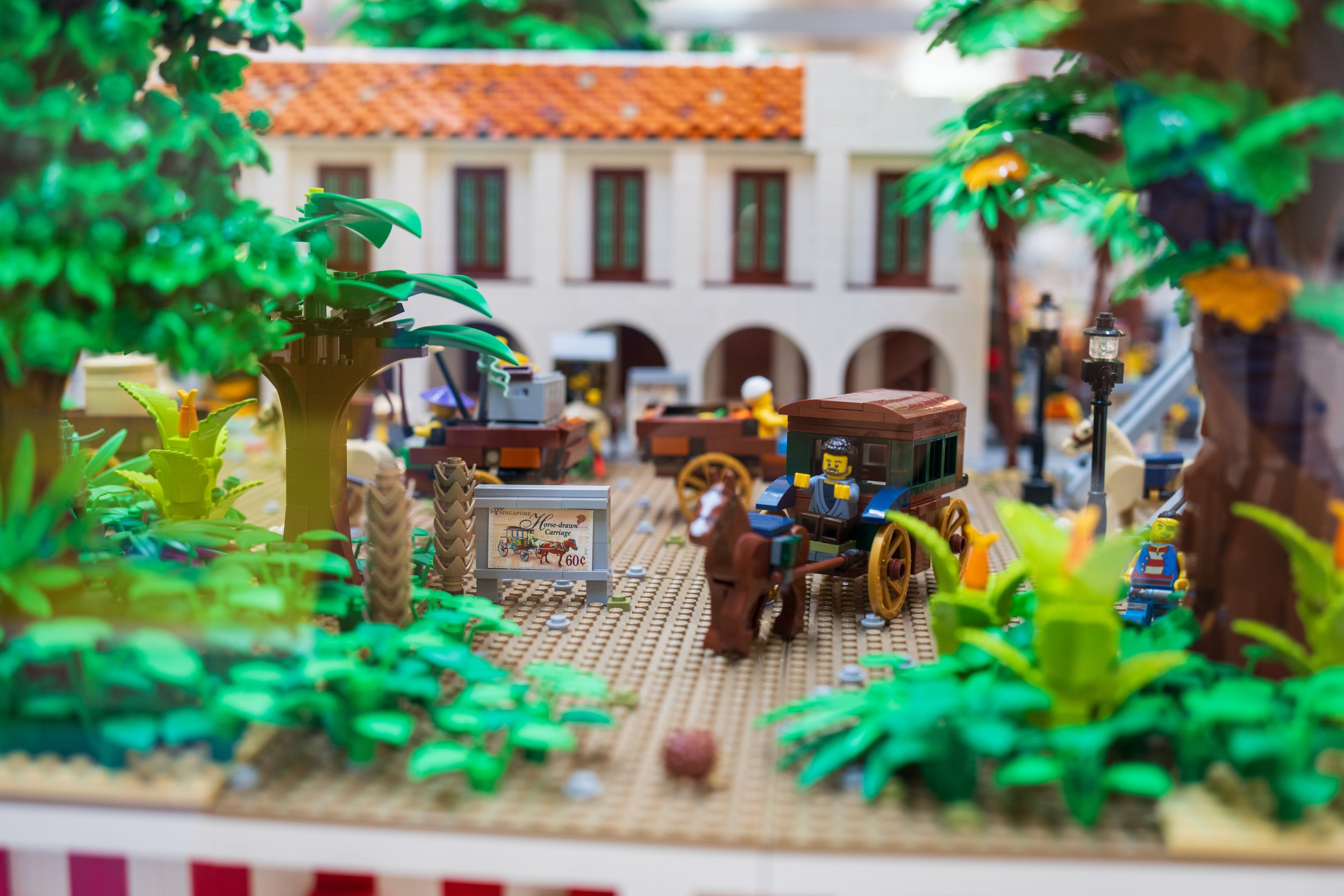 Close up photo of a lego scene of carriage rides.