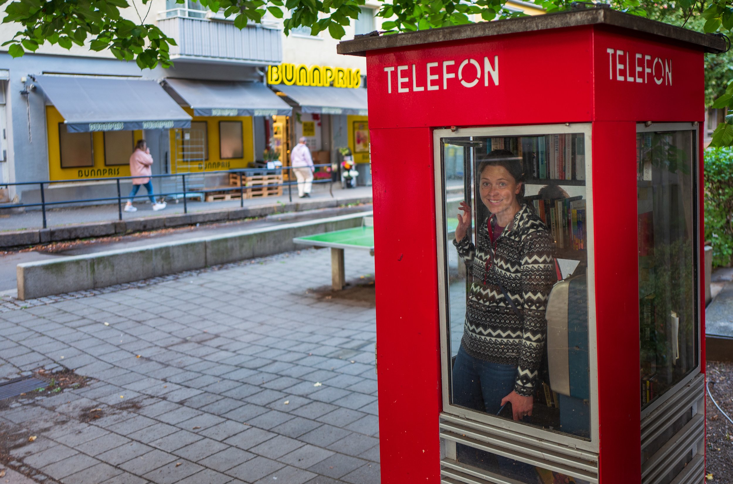Trying out a telefon booth (photo/Jason Rafal)