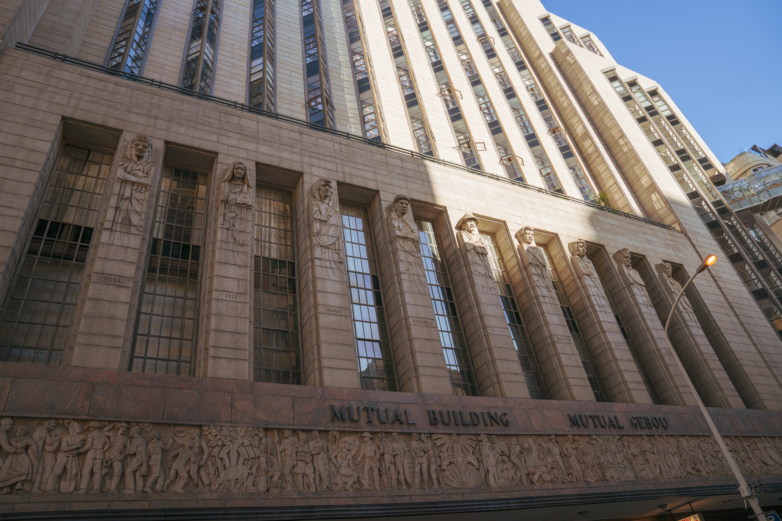  Carved faces representing the nine original tribes of South Africa - the Zulu, Xhosa, Bapedi, Batswana, South Ndebele, Basotho, Venda, Tsonga, and Swazi people (photo/Jason Rafal) 
