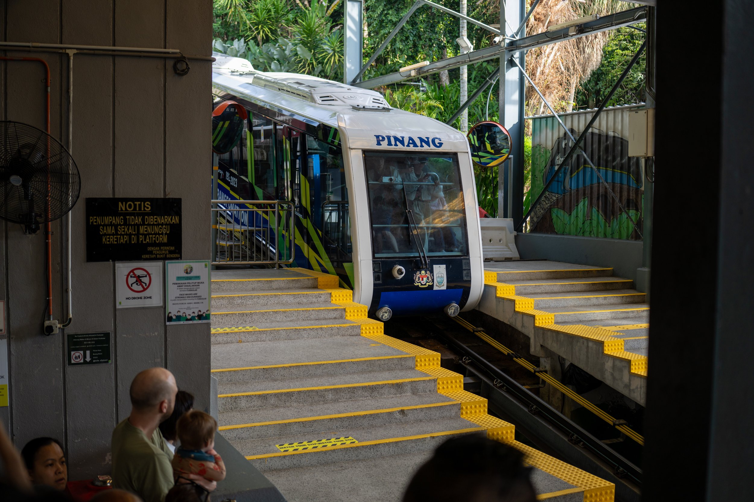 A funicular approaching a station.