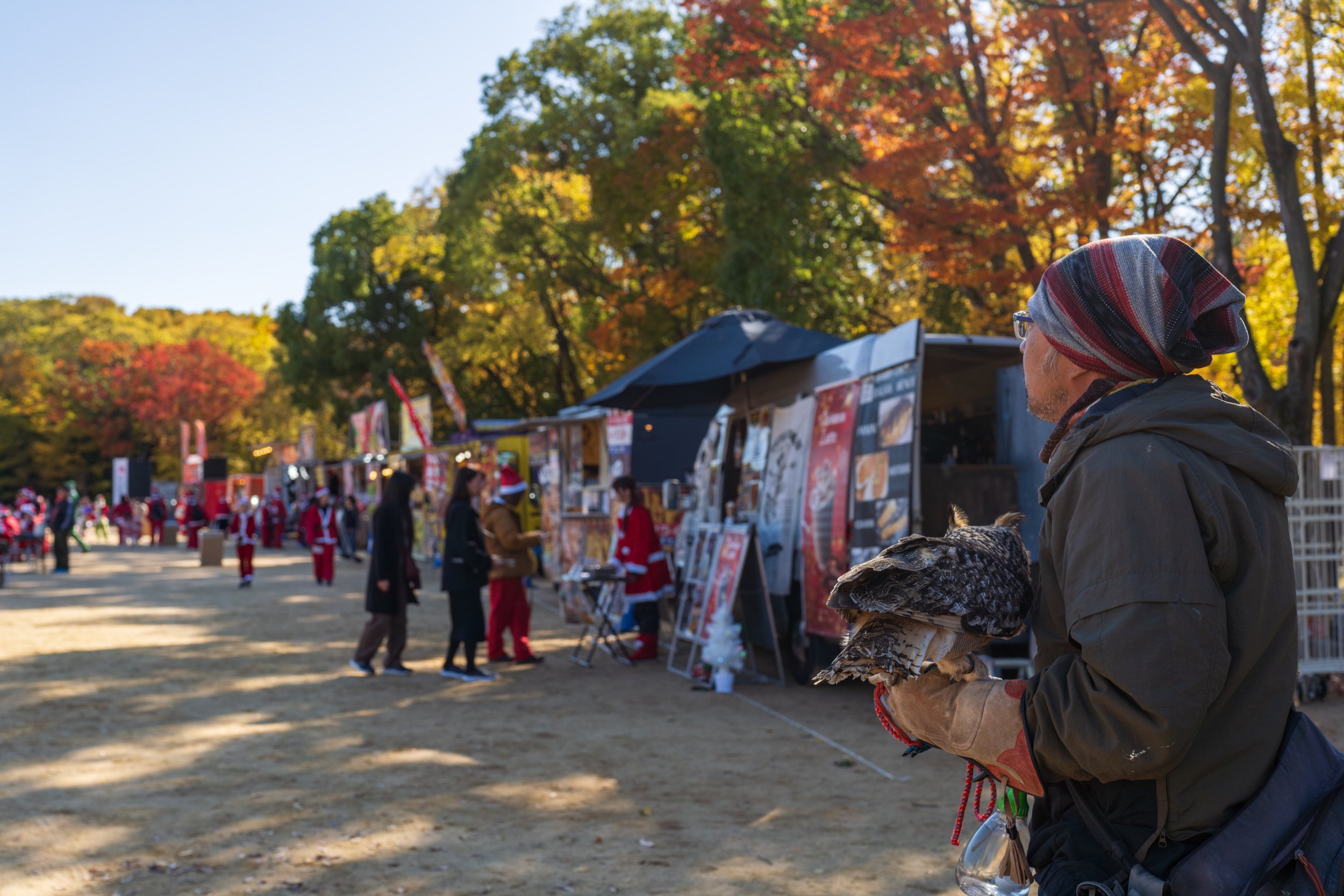  We saw people carrying owls a few times over the trip (photo/Jason Rafal) 