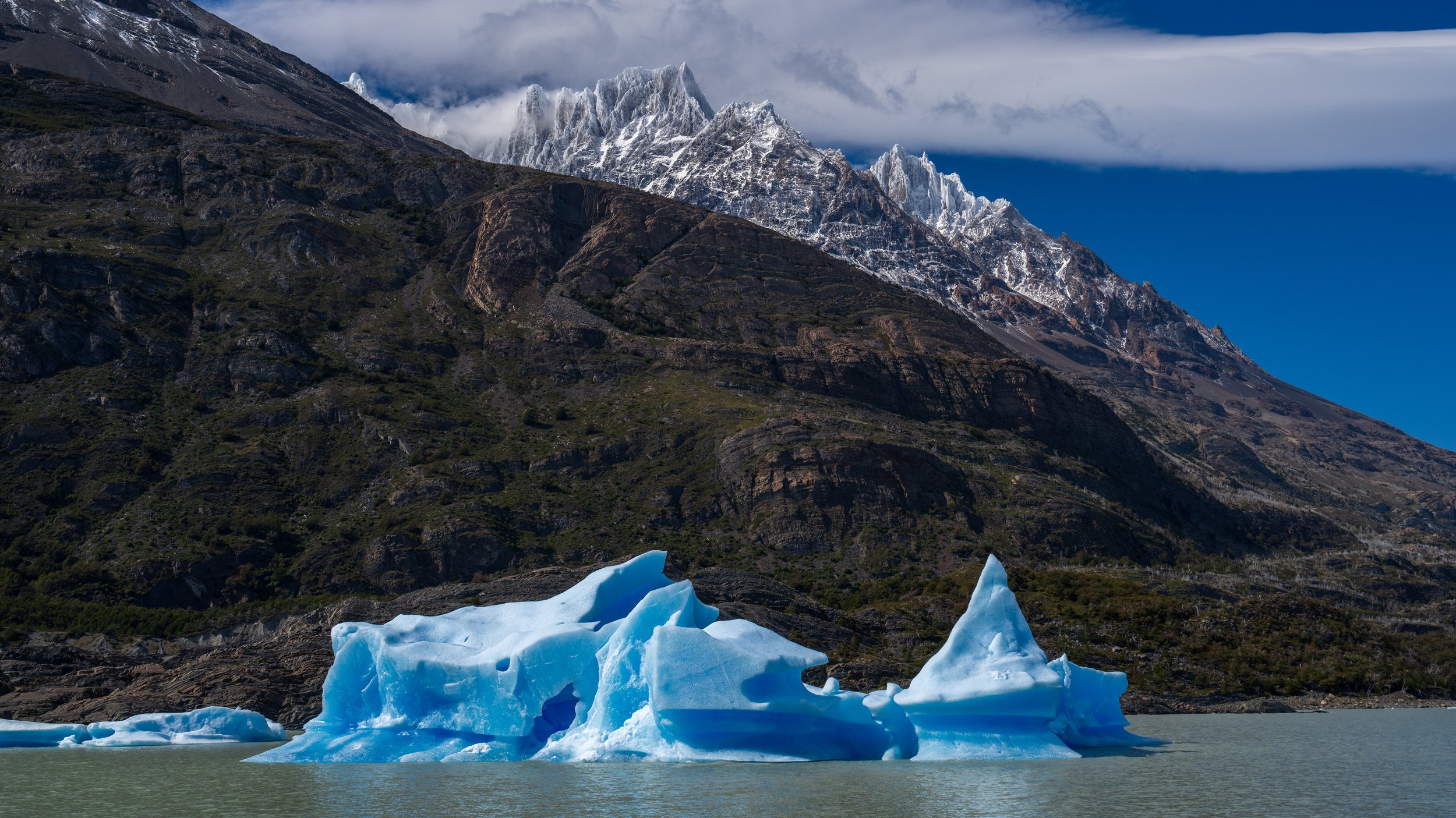  Icebergs and snowy peaks (photo/Jason Rafal) 