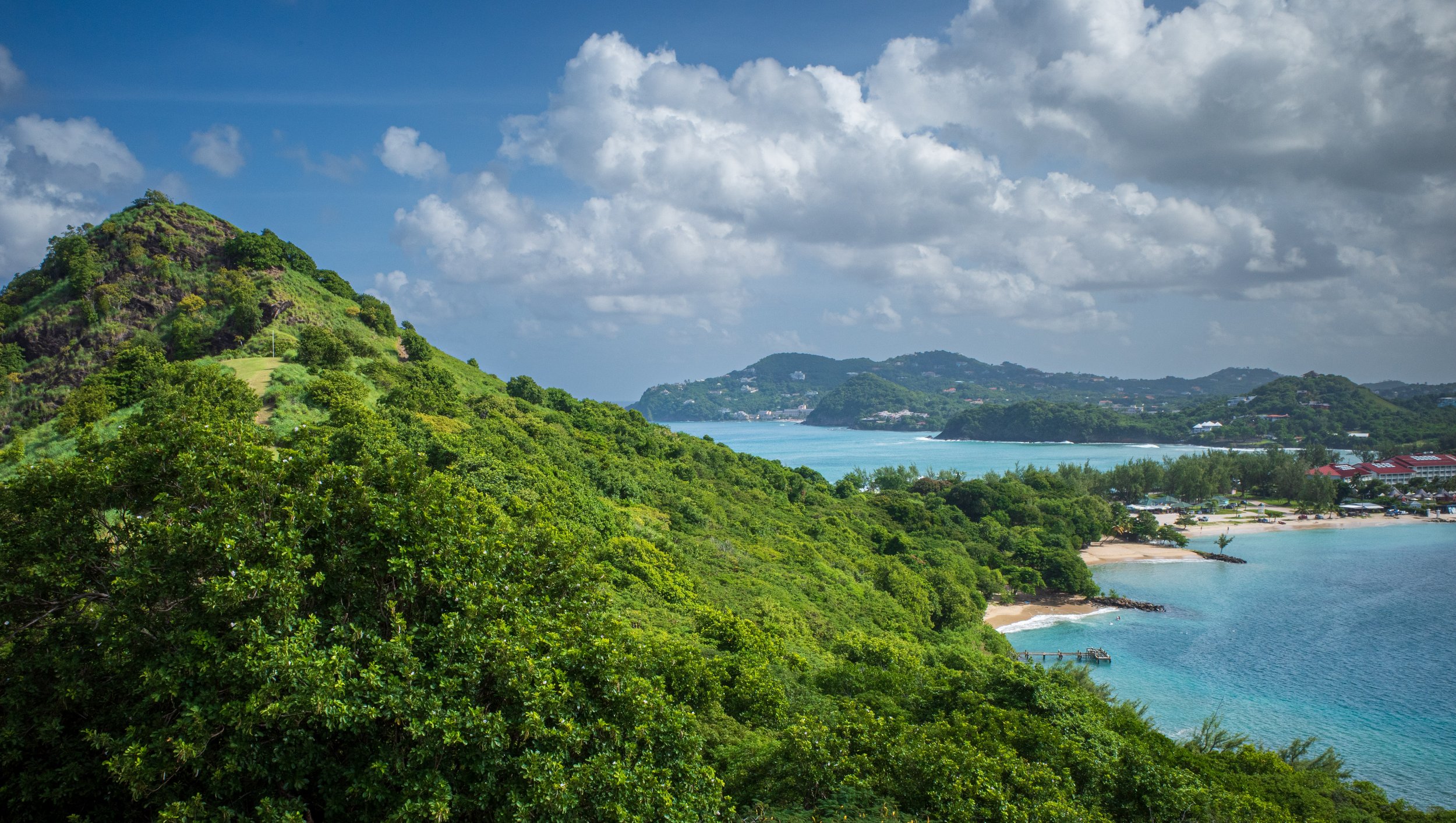 The island and the red roof of Sandals (photo/Jason Rafal)