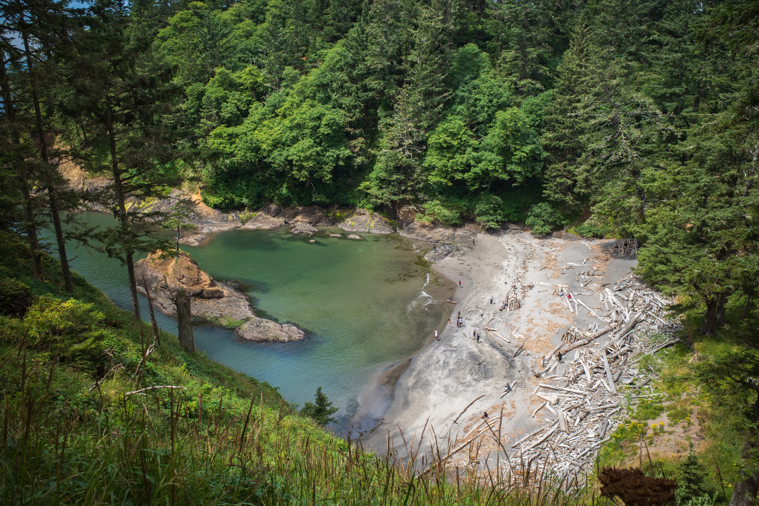Looking down into a cove of turquoise water.