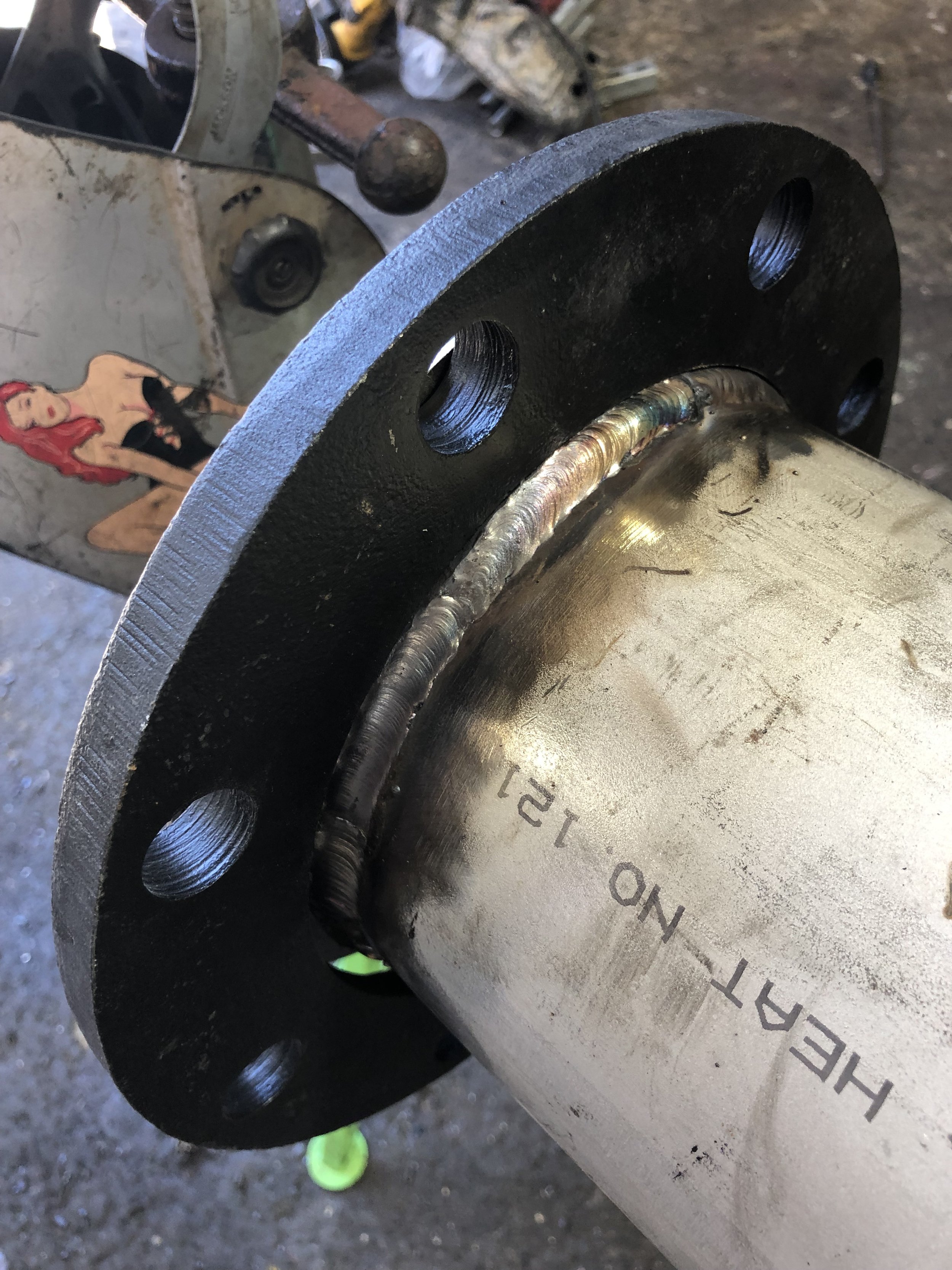 Carbon slip on flange on 308 SS in incolnel stick.