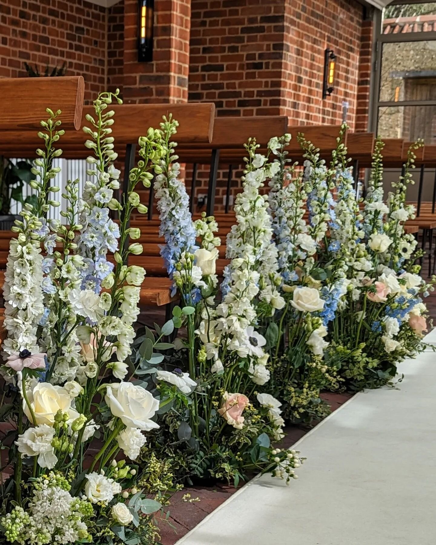 Adding a touch of elegance to our aisle with these stunning floral pew ends! 💐✨ From classic roses to whimsical wildflowers, these beauties bring a pop of color and romance to our ceremony. Book a consultation with us to chat about how these versati