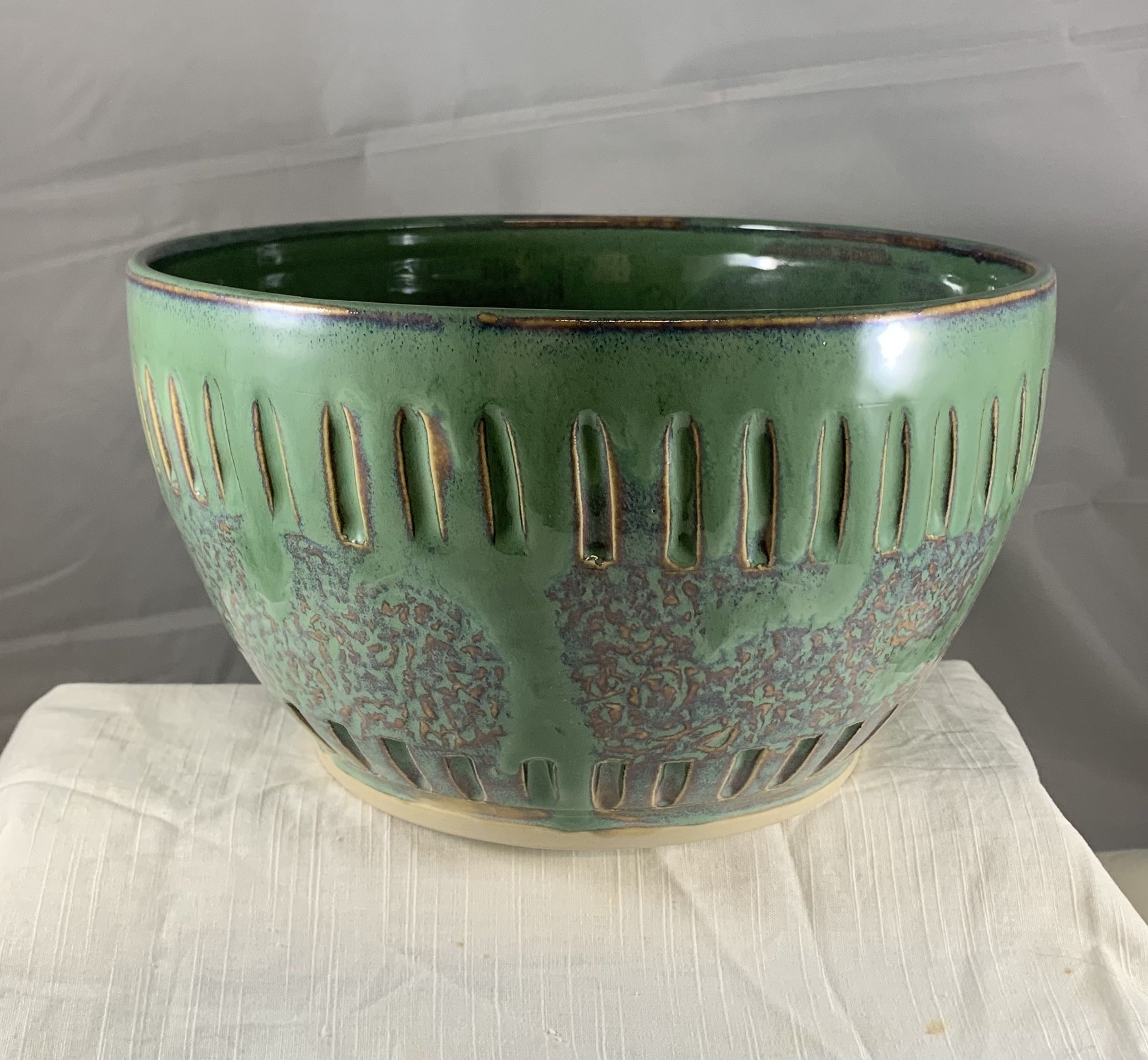 Large carved seafoam serving dish with