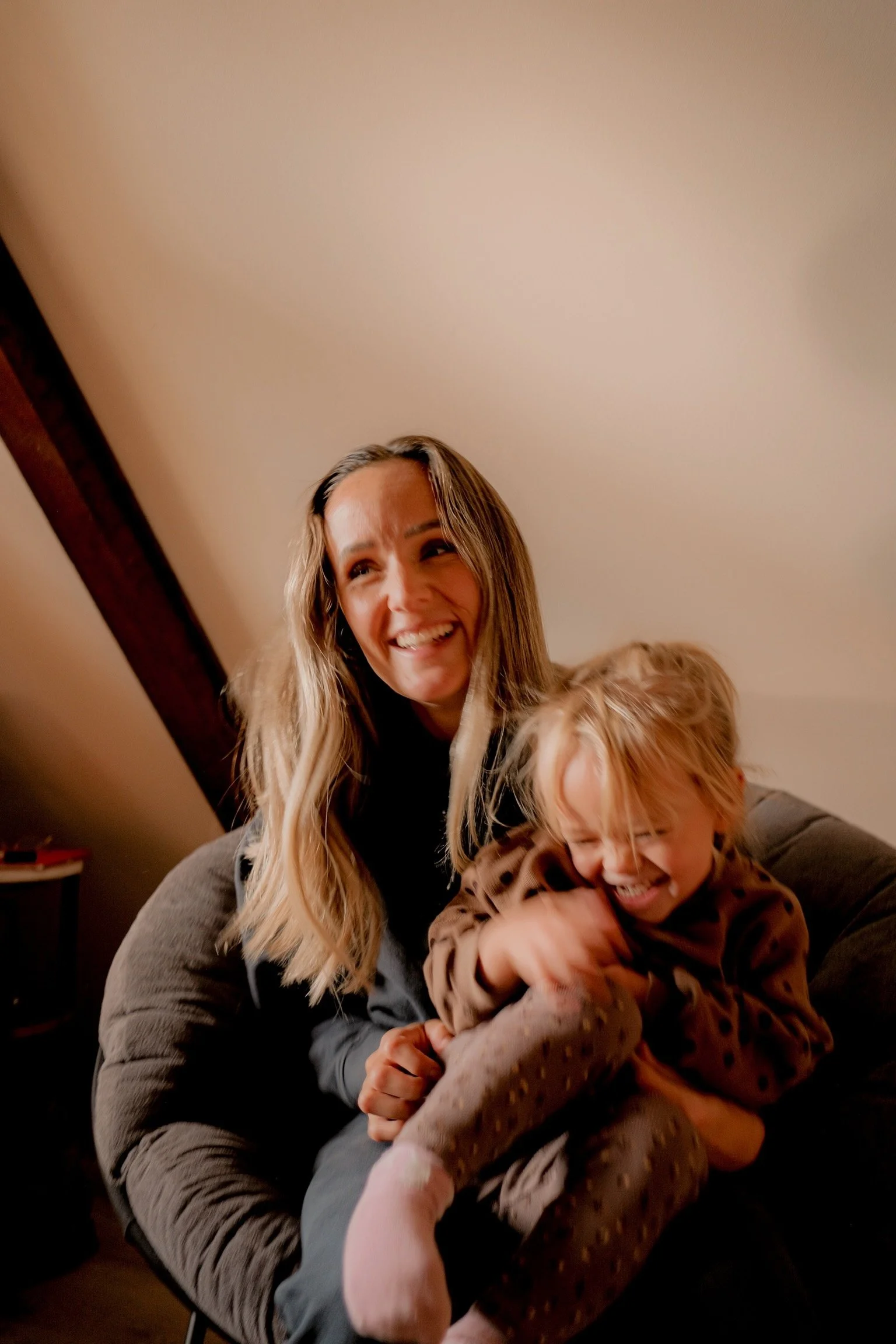 Mother and daughter laughing
