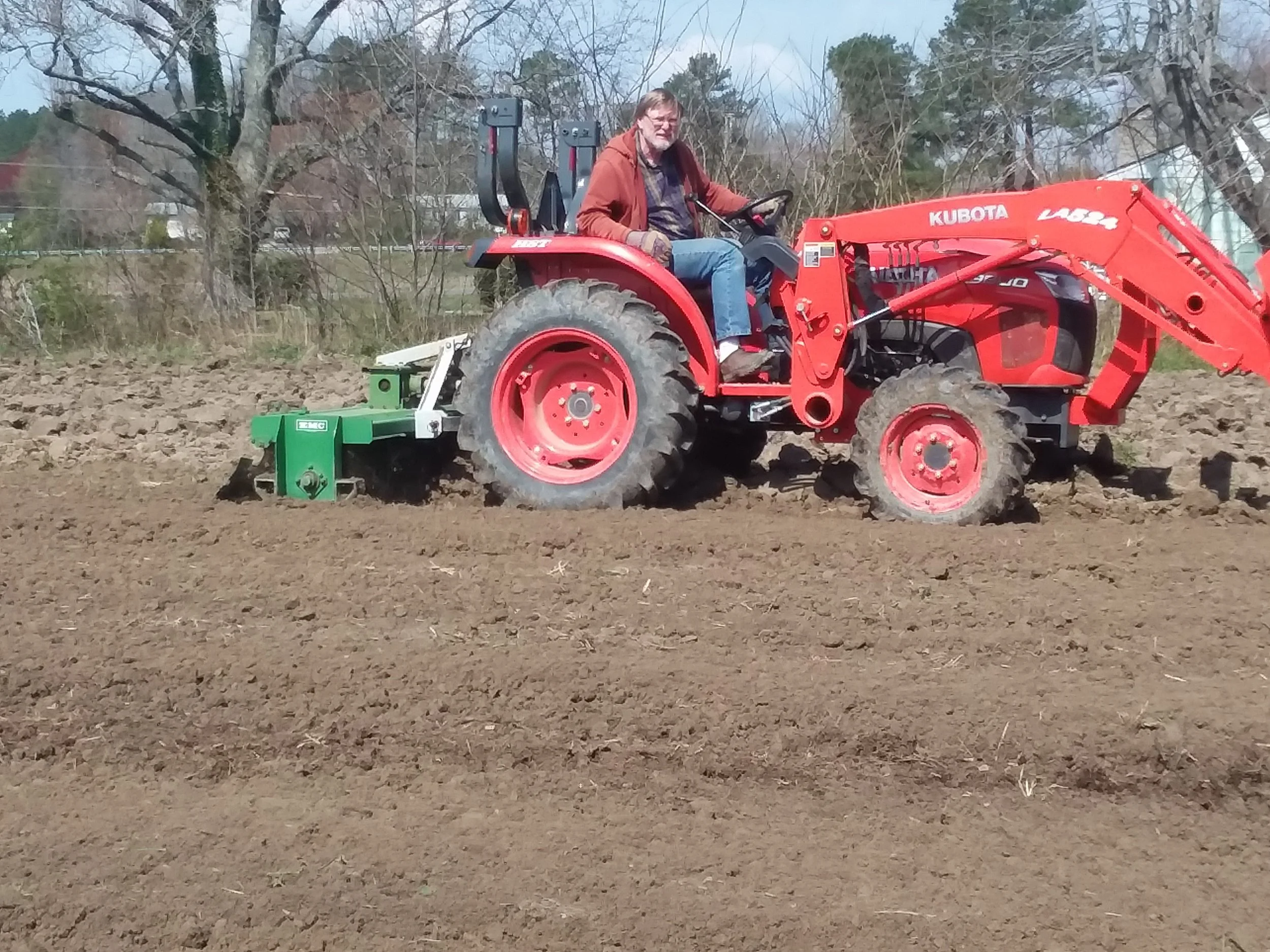 Jim on Tractor.jpg