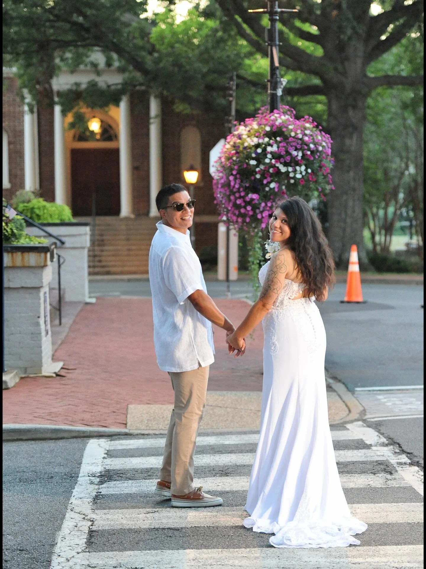 Michellelee &amp; Michael enjoy a summer sunset stroll in the #HeartofWarrenton after a joyful and enchanting wedding ceremony. Congratulations to this lovely couple and their beautiful blended family! &hearts;️😎🥳

#virginiaisforlovers #lovewarrent