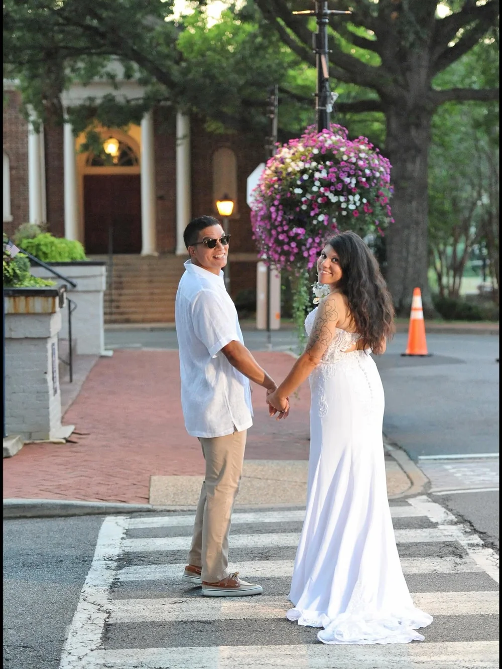 Michellelee &amp; Michael enjoy a summer sunset stroll in the #HeartofWarrenton after a joyful and enchanting wedding ceremony. Congratulations to this lovely couple and their beautiful blended family! &hearts;️😎🥳

#virginiaisforlovers #lovewarrent