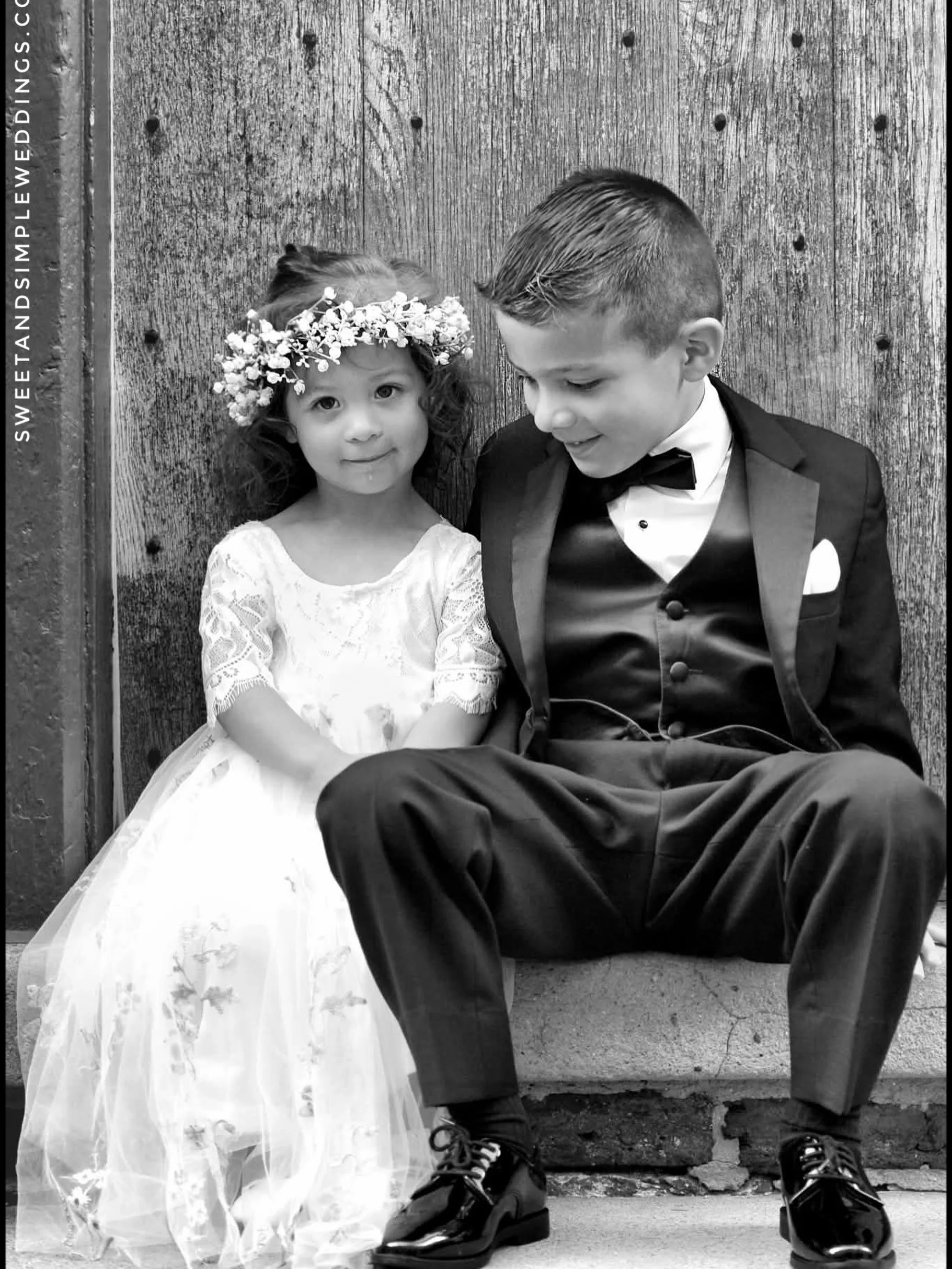Ring Man &amp; Flower Girl take a short respite from their duties during a recent courtyard wedding at the Fauquier History Museum. 

Moments like this bring joy to our work and help to make our Sweet &amp; Simple Weddings, and the #HeartofWarrenton,