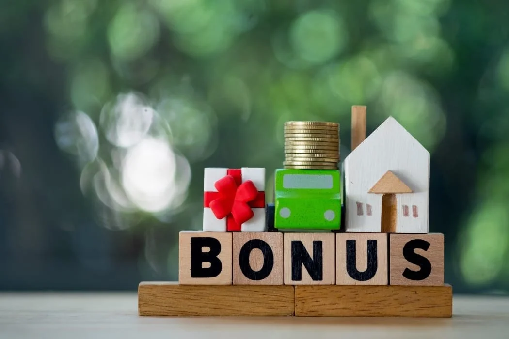 How to Use Your Year-End Bonus Toward Buying a Home or Investment Property