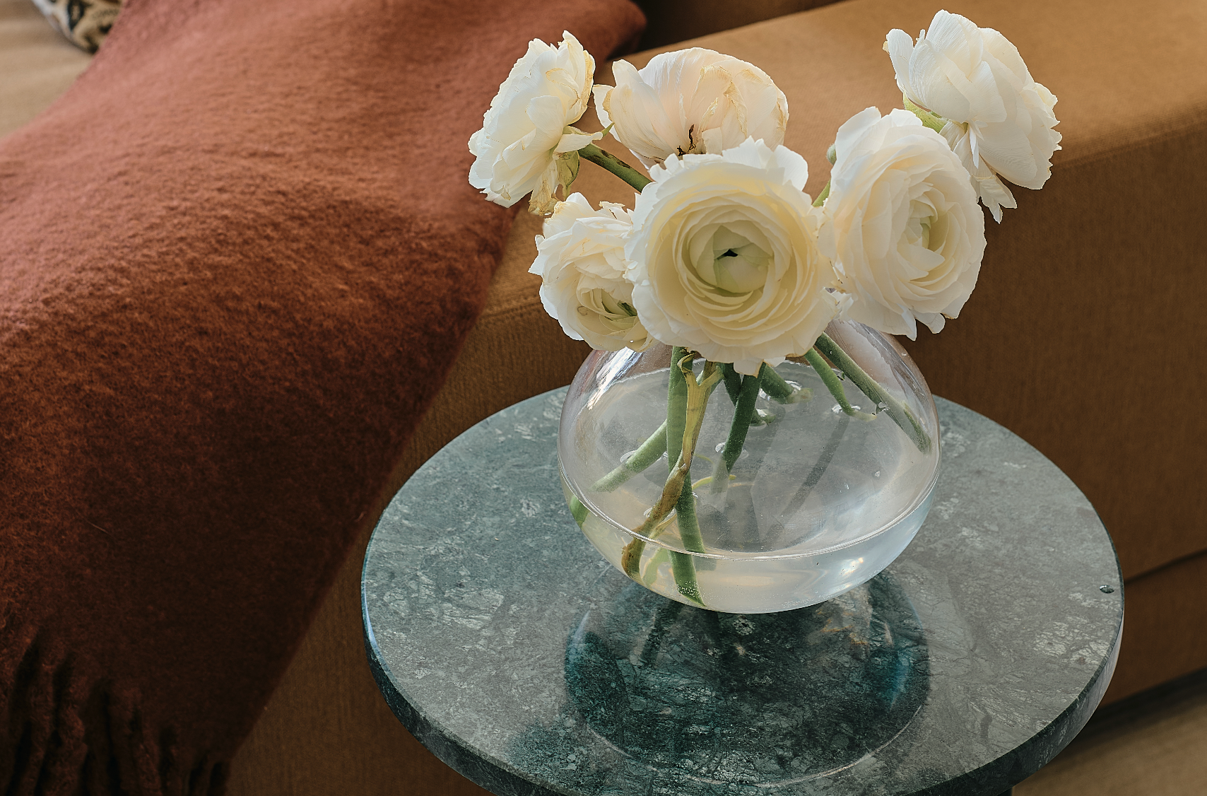 Vintage side table with fresh flowers in a Brooklyn home designed by Hallie Rose Design