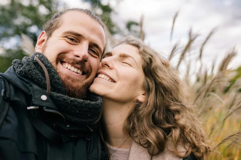 a happy couple smiling