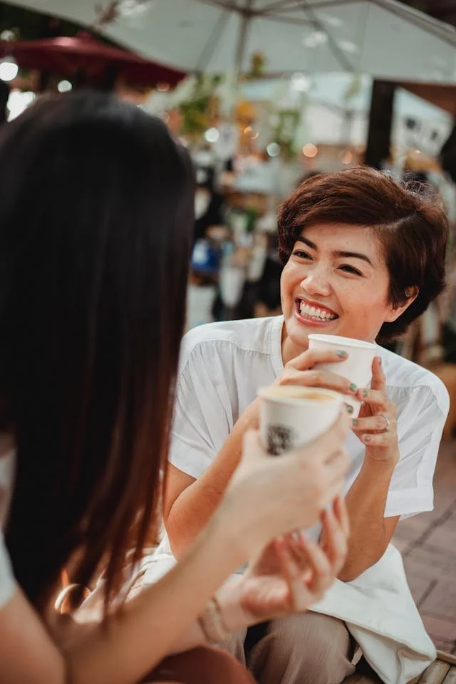 A woman having coffee with her friend